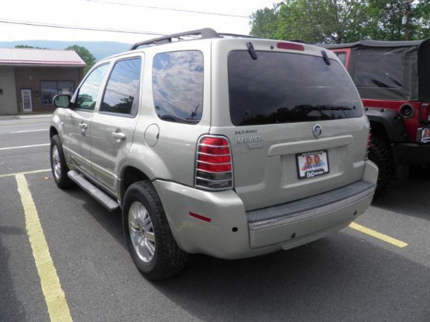 2005 TAN Mercury Mariner Luxury 2WD (4M2YU56125D) with an 3.0L V6 engine, AT transmission, located at 15520 McMullen Hwy SW, Belair, MD, 21502, (301) 729-3700, 39.581375, -78.846451 - Photo#5