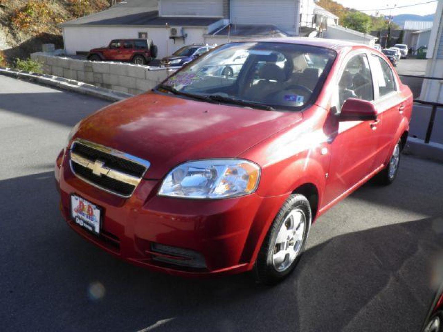 2007 Red /Neutral Cloth Seats Chevrolet Aveo LS 4-Door (KL1TD56627B) with an 1.6L I4 engine, AT transmission, located at 15520 McMullen Hwy SW, Belair, MD, 21502, (301) 729-3700, 39.581375, -78.846451 - Photo#0