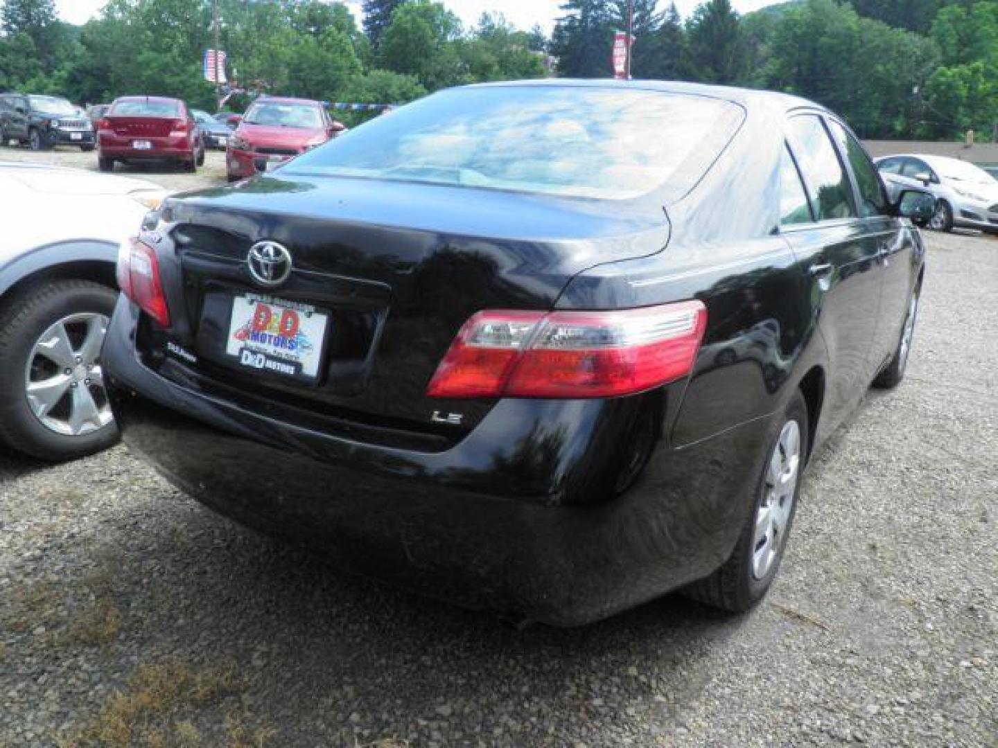 2007 Black Toyota Camry CE | LE | SE | XLE (4T1BE46K57U) with an 2.4L I4 engine, AT transmission, located at 19521 New George's Creek Rd SW, Barton, MD, 21521, (301) 463-2404, 39.524323, -79.017906 - Photo#3
