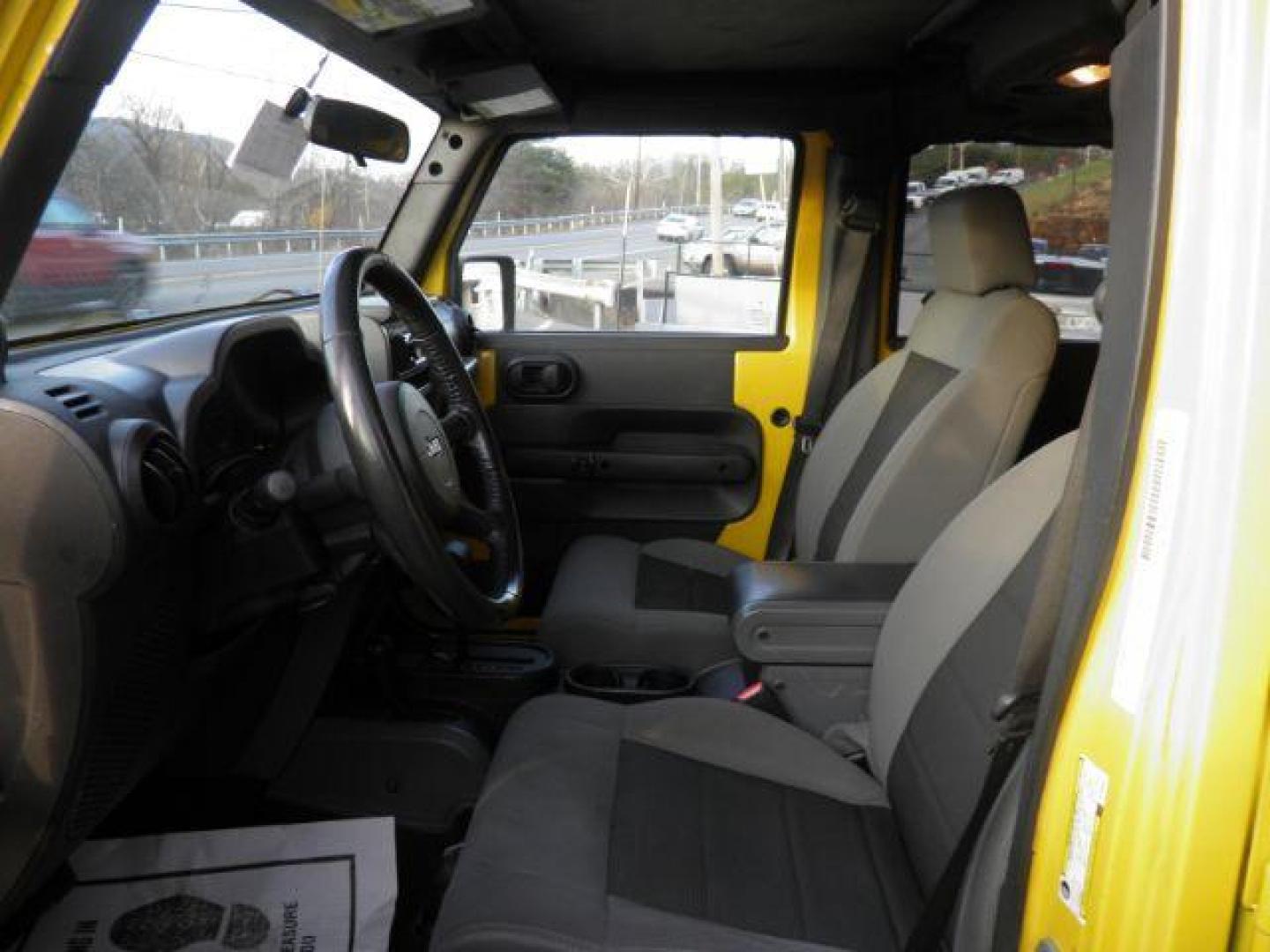2008 Yellow Jeep Wrangler Unlimited X (1J8GA39198L) with an 3.8L V6 engine, AT transmission, located at 15520 McMullen Hwy SW, Belair, MD, 21502, (301) 729-3700, 39.581375, -78.846451 - Photo#1