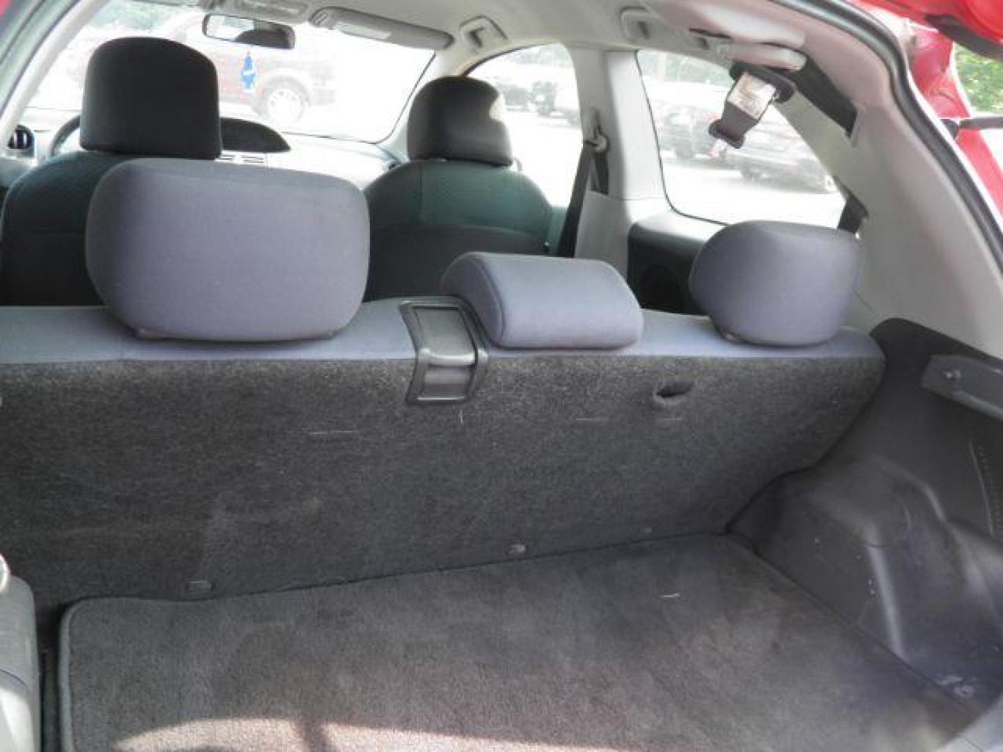 2008 Red Toyota Yaris Liftback S (JTDJT923185) with an 1.5L I4 engine, AT transmission, located at 19521 New George's Creek Rd SW, Barton, MD, 21521, (301) 463-2404, 39.524323, -79.017906 - Photo#4