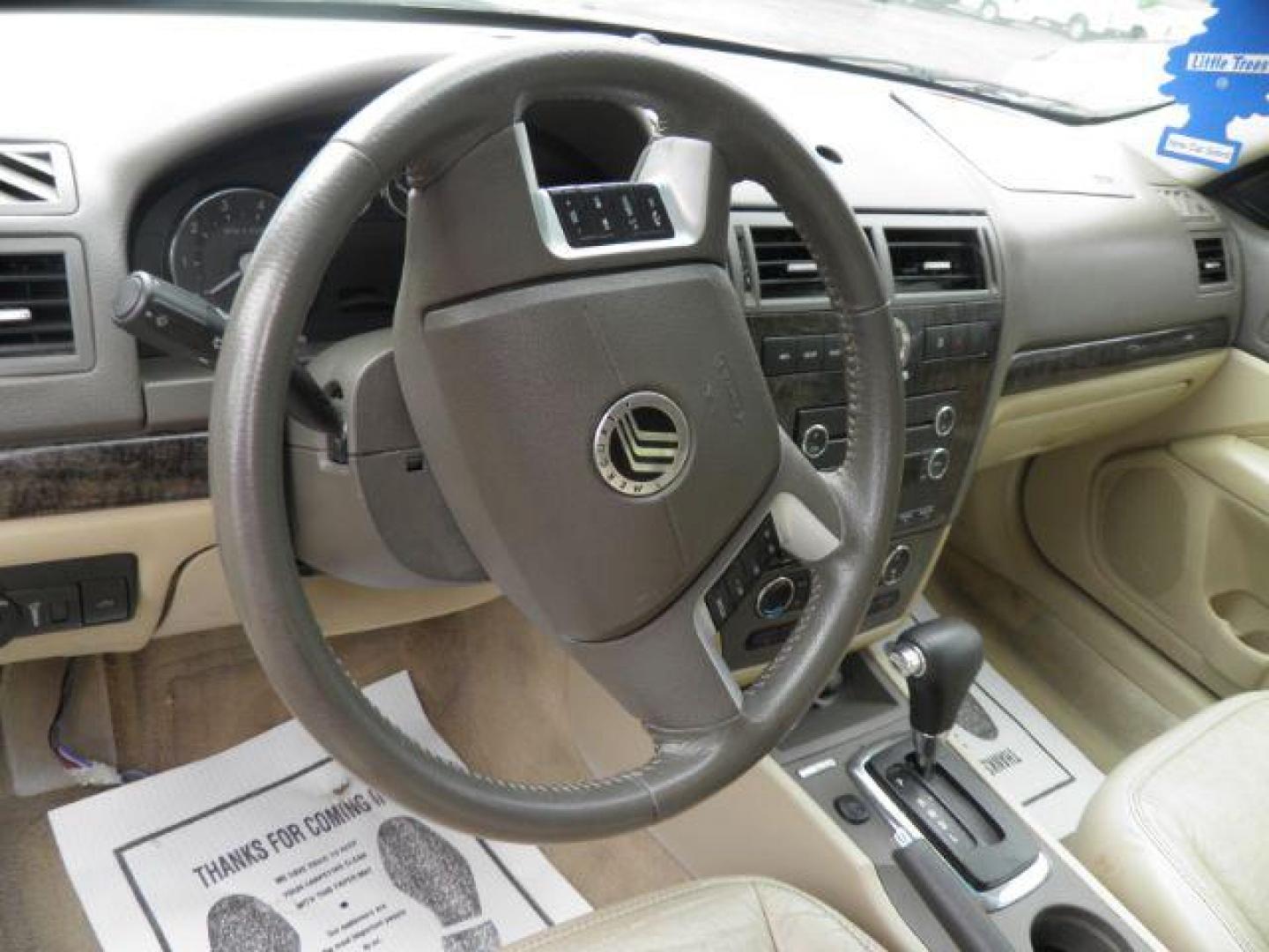 2009 White Mercury Milan V6 Premier (3MEHM08169R) with an 3.0L V6 engine, AT transmission, located at 19521 New George's Creek Rd SW, Barton, MD, 21521, (301) 463-2404, 39.524323, -79.017906 - Photo#2