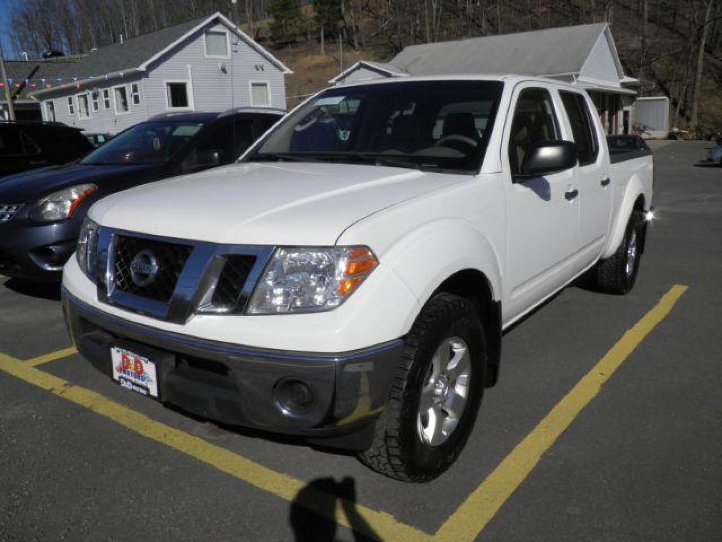 2009 White Nissan Frontier SE (1N6AD09W89C) with an 4.0L V6 engine, AT transmission, located at 15520 McMullen Hwy SW, Belair, MD, 21502, (301) 729-3700, 39.581375, -78.846451 - Photo#0