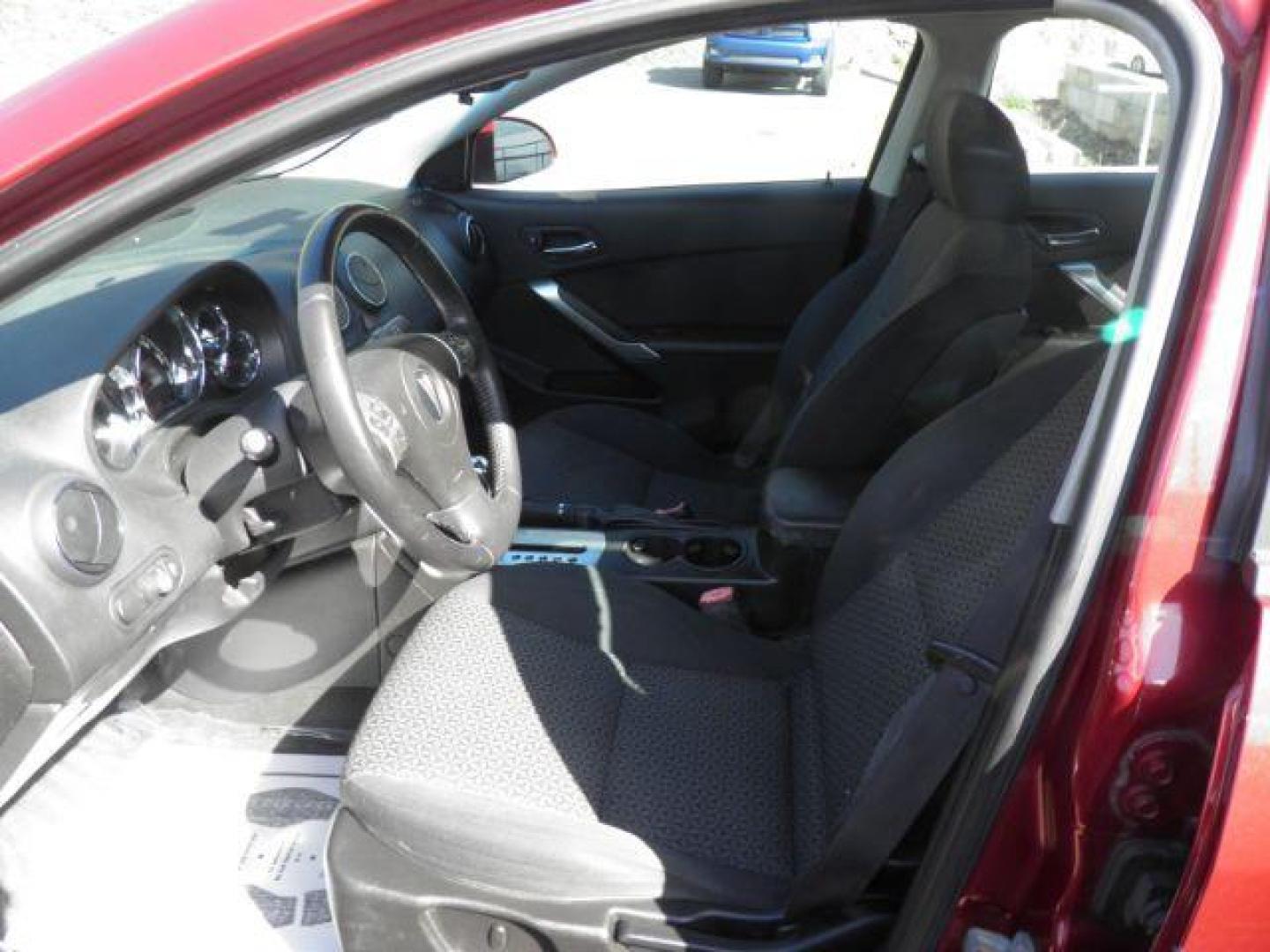 2009 RED Pontiac G6 Sedan (1G2ZJ57K794) with an 3.5L V6 OHV 12V engine, AT transmission, located at 15520 McMullen Hwy SW, Belair, MD, 21502, (301) 729-3700, 39.581375, -78.846451 - Photo#1