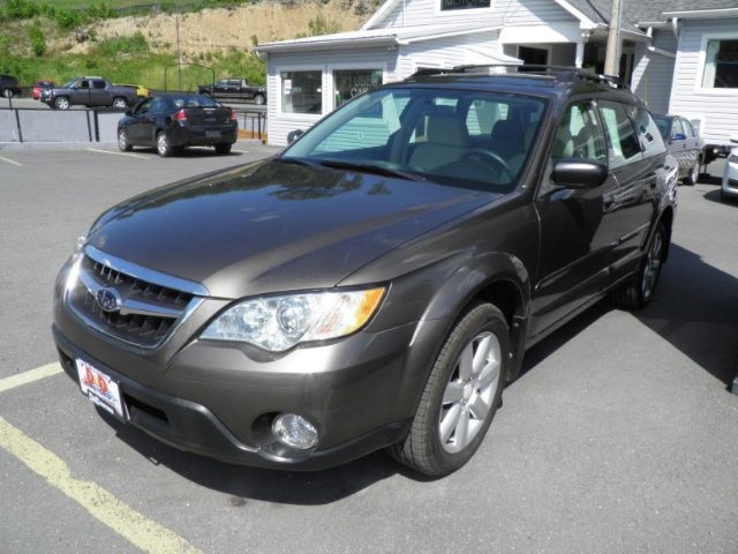 2009 BROWN Subaru Outback 2.5i (4S4BP61C897) with an 2.5 L4 engine, CVT transmission, located at 15520 McMullen Hwy SW, Belair, MD, 21502, (301) 729-3700, 39.581375, -78.846451- Photo#0