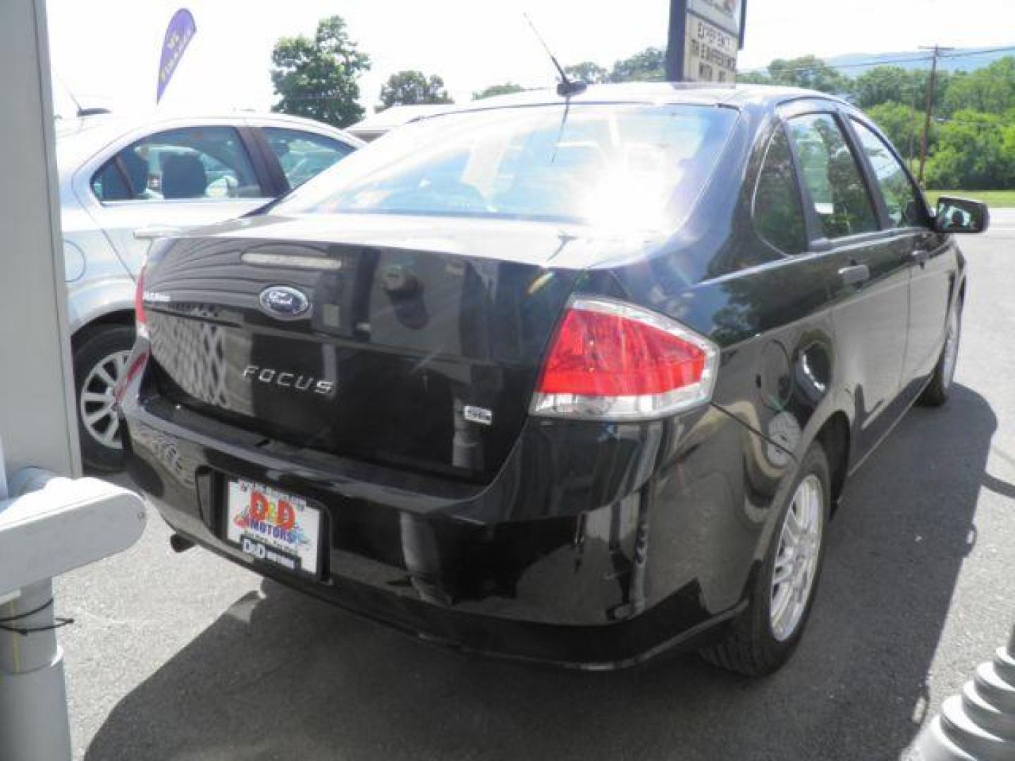 2010 Black Ford Focus SE (1FAHP3FNXAW) with an 2.4L I4 engine, AT transmission, located at 15520 McMullen Hwy SW, Belair, MD, 21502, (301) 729-3700, 39.581375, -78.846451 - Photo#4