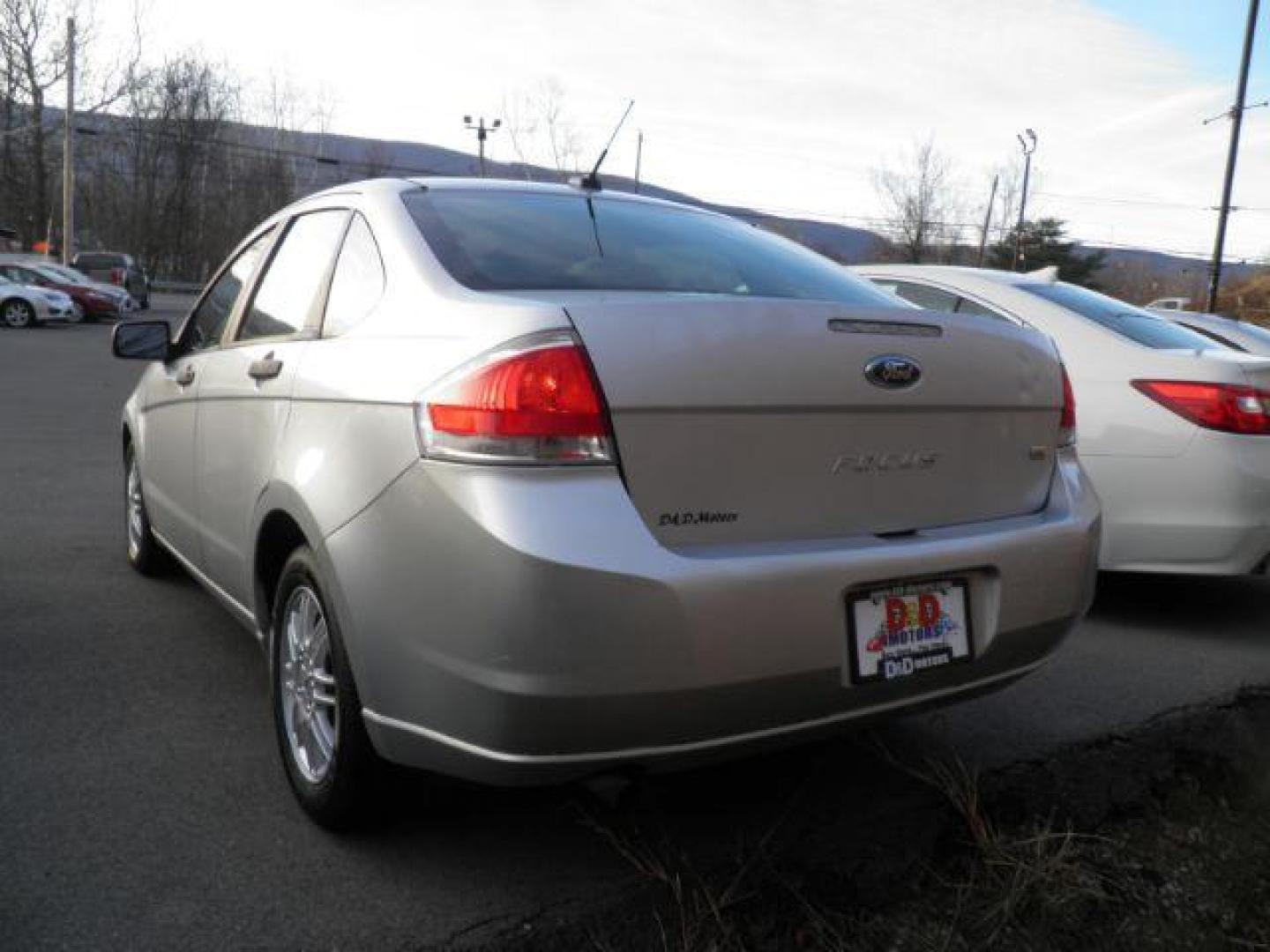 2010 Silver Ford Focus SE (1FAHP3FN7AW) with an 2.0L I4 engine, AT transmission, located at 15520 McMullen Hwy SW, Belair, MD, 21502, (301) 729-3700, 39.581375, -78.846451 - Photo#4
