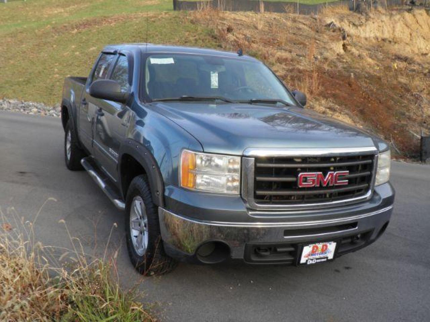 2010 Green GMC Sierra 1500 SLE (3GTRKVE37AG) with an 5.3L V8 engine, AT transmission, located at 15520 McMullen Hwy SW, Belair, MD, 21502, (301) 729-3700, 39.581375, -78.846451 - Photo#0