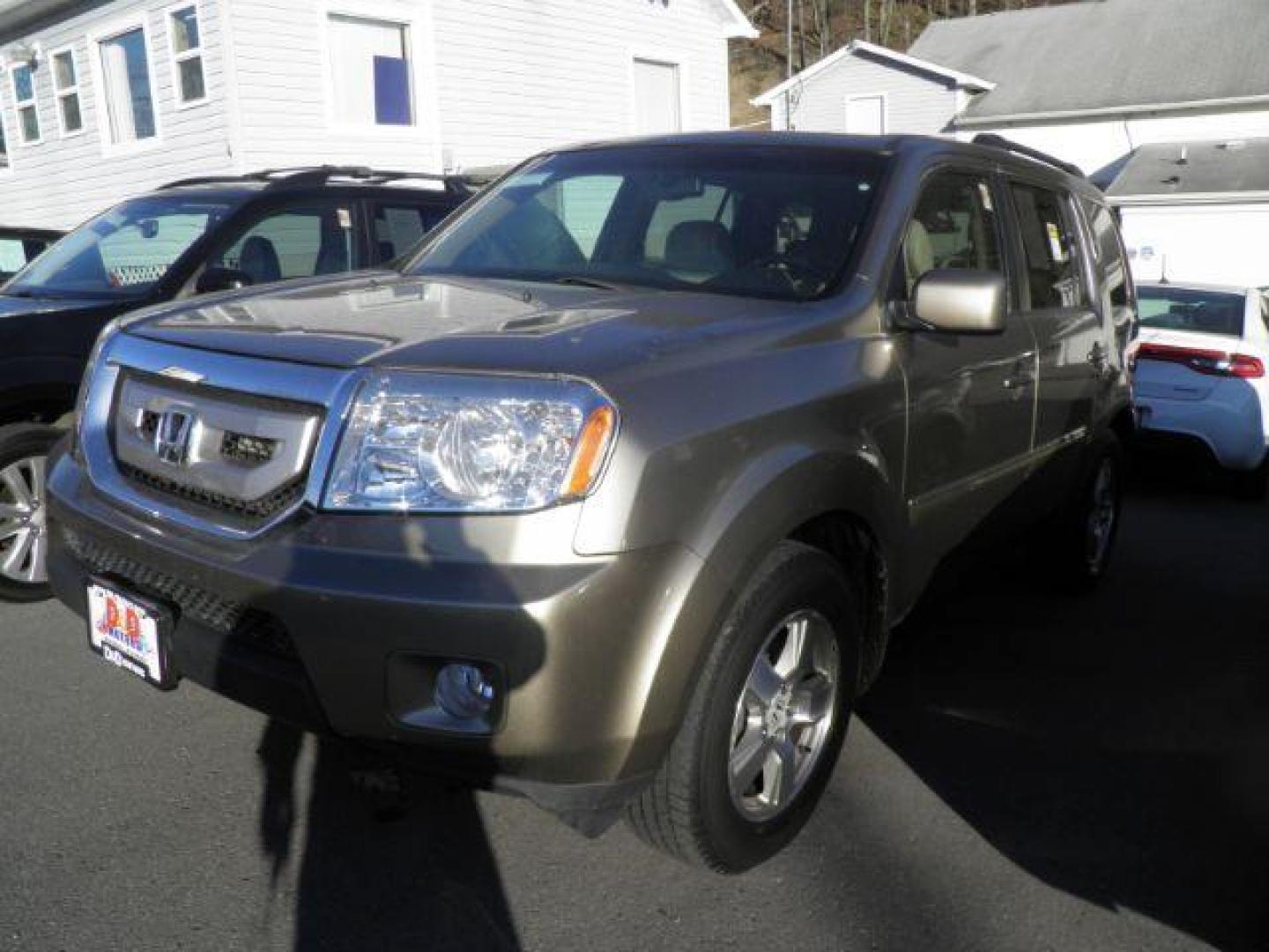 2010 Tan Honda Pilot EX-L (5FNYF4H59AB) with an 3.5L V6 engine, AT transmission, located at 15520 McMullen Hwy SW, Belair, MD, 21502, (301) 729-3700, 39.581375, -78.846451 - Photo#0
