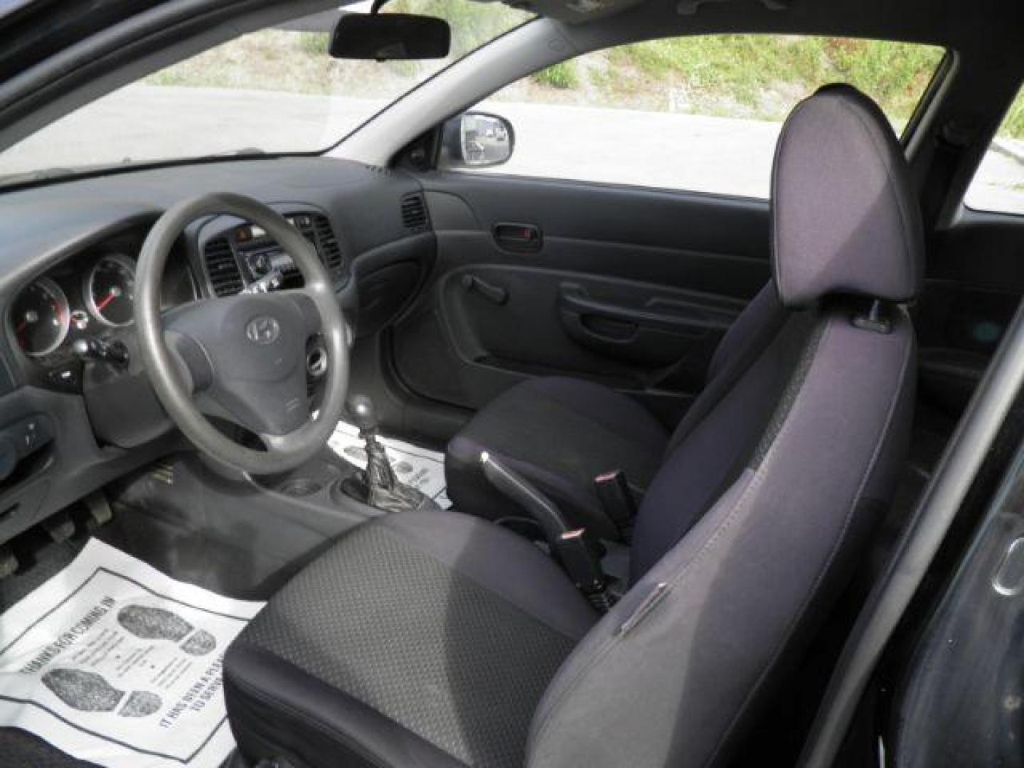 2010 Black Hyundai Accent GS (KMHCM3AC0AU) with an 1.6L I4 engine, MAN transmission, located at 15520 McMullen Hwy SW, Belair, MD, 21502, (301) 729-3700, 39.581375, -78.846451 - Photo#1