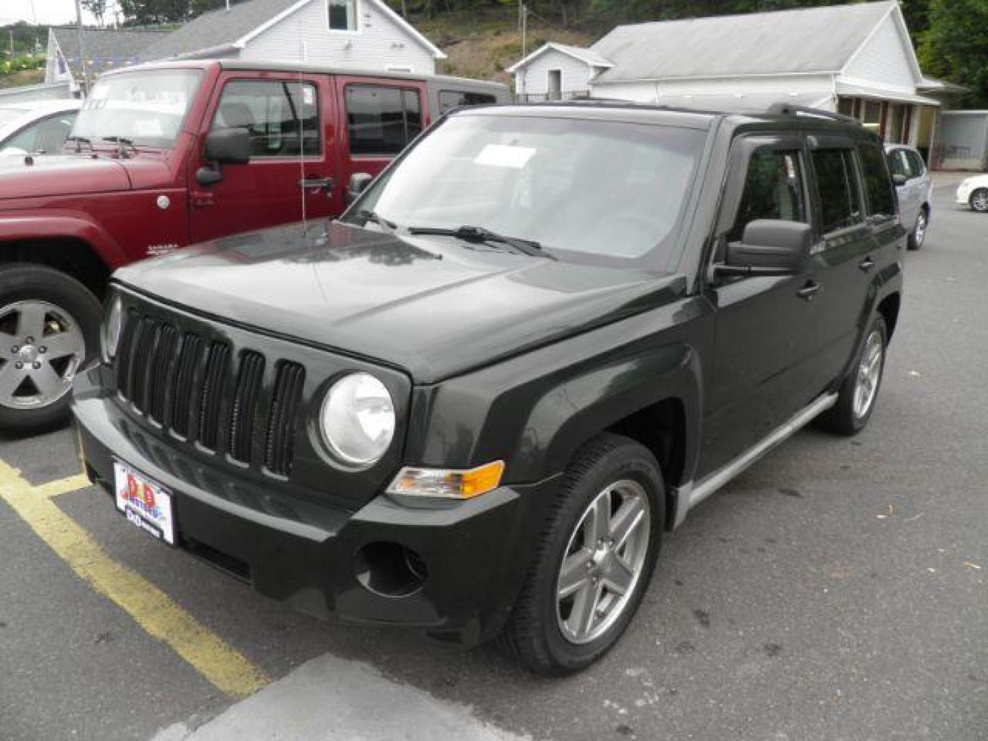2010 Green Jeep Patriot Sport (1J4NF2GB0AD) with an 2.4L I4 engine, AT transmission, located at 15520 McMullen Hwy SW, Belair, MD, 21502, (301) 729-3700, 39.581375, -78.846451 - Photo#0