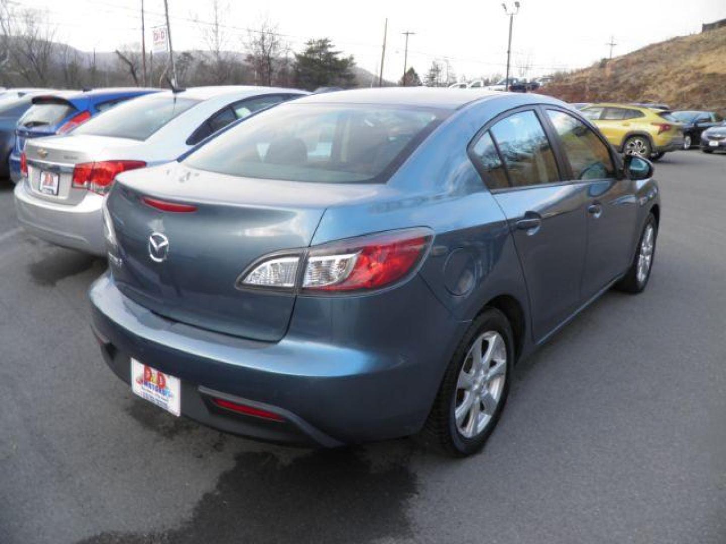 2010 Blue Mazda Mazda3 i Touring (JM1BL1SF6A1) with an 2.0L I4 engine, AT transmission, located at 15520 McMullen Hwy SW, Belair, MD, 21502, (301) 729-3700, 39.581375, -78.846451 - Photo#4