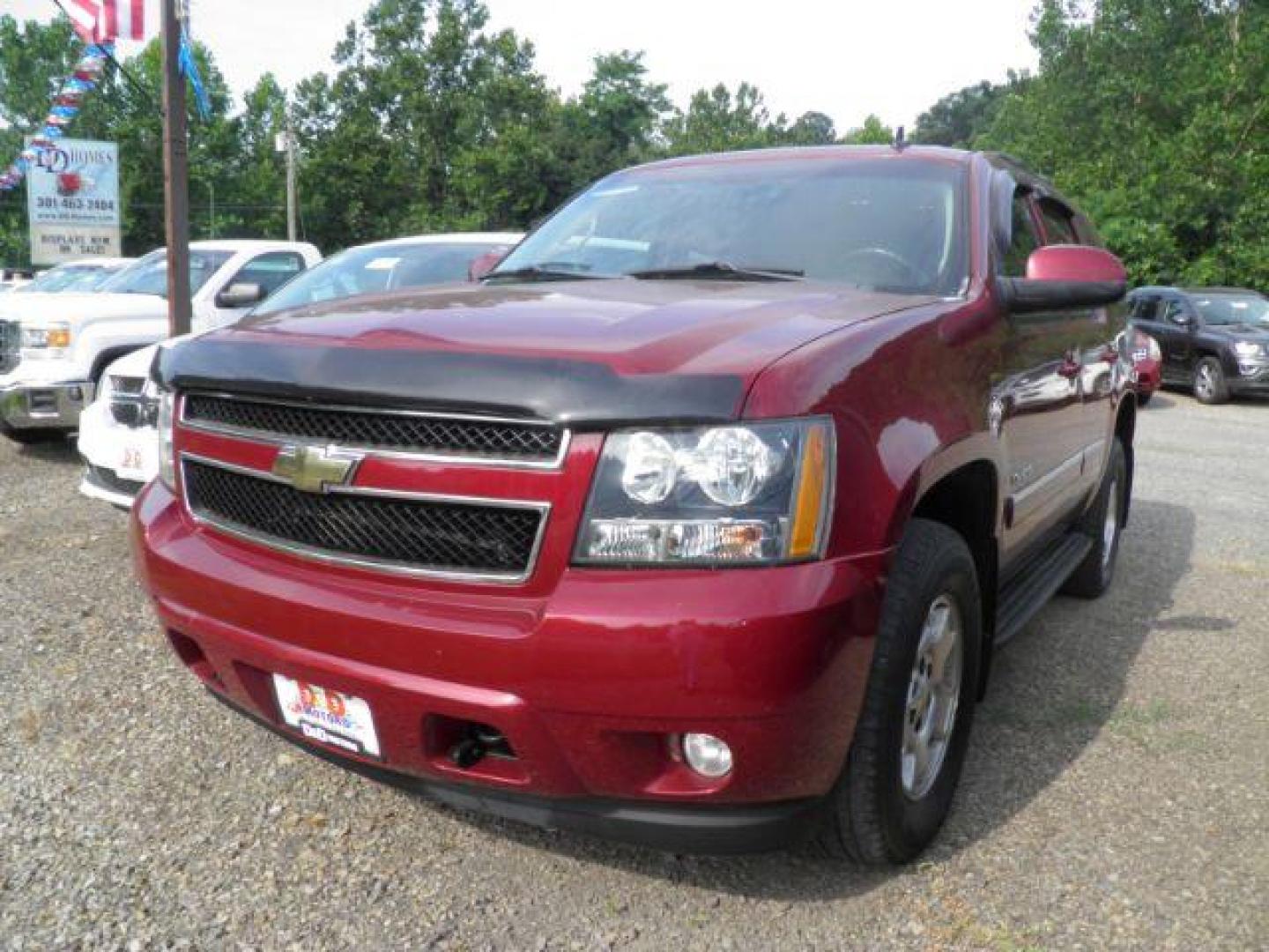 2011 Red Chevrolet Tahoe LT (1GNSKBE02BR) with an 5.3L V8 engine, AT transmission, located at 19521 New George's Creek Rd SW, Barton, MD, 21521, (301) 463-2404, 39.524323, -79.017906 - Photo#0
