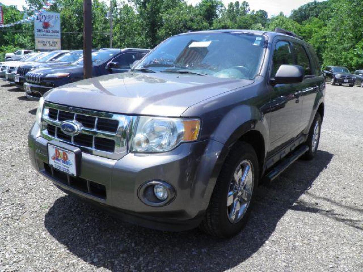 2011 GRAY Ford Escape XLT 4WD (1FMCU9DG0BK) with an 3.0 V6 engine, AT transmission, located at 19521 New George's Creek Rd SW, Barton, MD, 21521, (301) 463-2404, 39.524323, -79.017906 - Photo#0