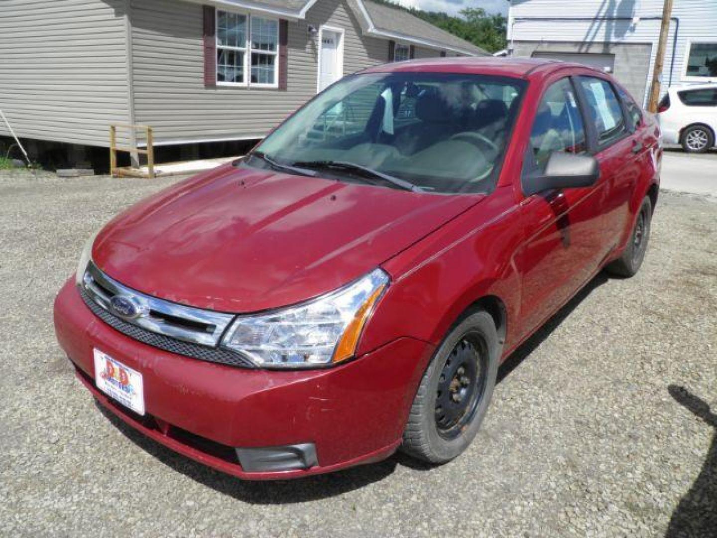 2011 RED Ford Focus S Sedan (1FAHP3EN6BW) with an 2.0L L4 DOHC 16V engine, 5SP transmission, located at 19521 New George's Creek Rd SW, Barton, MD, 21521, (301) 463-2404, 39.524323, -79.017906 - Photo#0