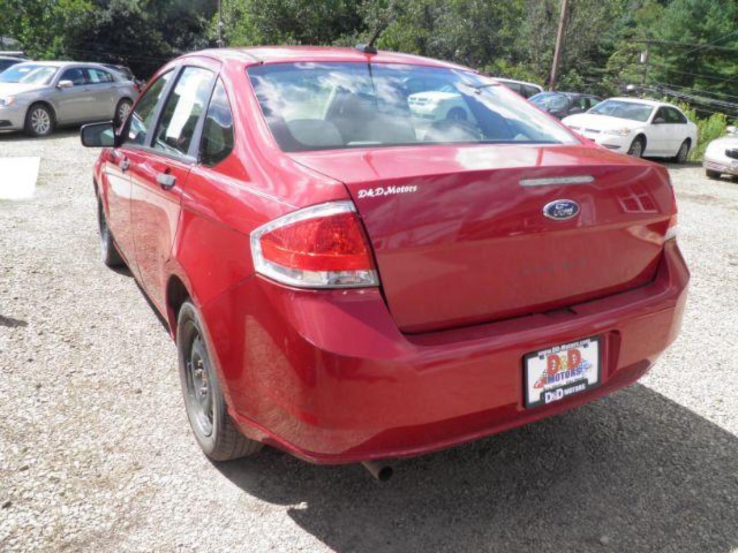 2011 RED Ford Focus S Sedan (1FAHP3EN6BW) with an 2.0L L4 DOHC 16V engine, 5SP transmission, located at 19521 New George's Creek Rd SW, Barton, MD, 21521, (301) 463-2404, 39.524323, -79.017906 - Photo#4