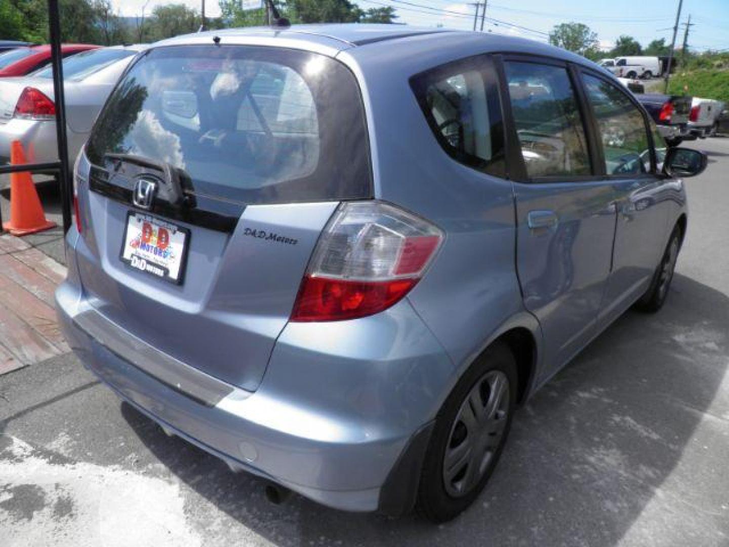 2011 Blue Honda Fit BASE (JHMGE8H37BC) with an 2.4L I4 engine, AT transmission, located at 15520 McMullen Hwy SW, Belair, MD, 21502, (301) 729-3700, 39.581375, -78.846451 - Photo#5