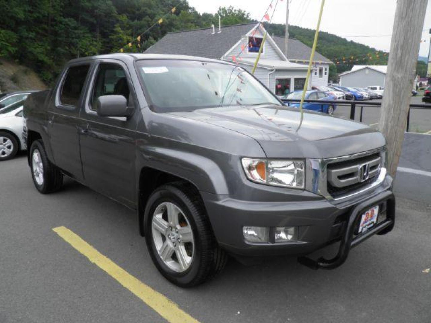 2011 Gray Honda Ridgeline RTL (5FPYK1F51BB) with an 3.5L V6 engine, AT transmission, located at 15520 McMullen Hwy SW, Belair, MD, 21502, (301) 729-3700, 39.581375, -78.846451 - Photo#0
