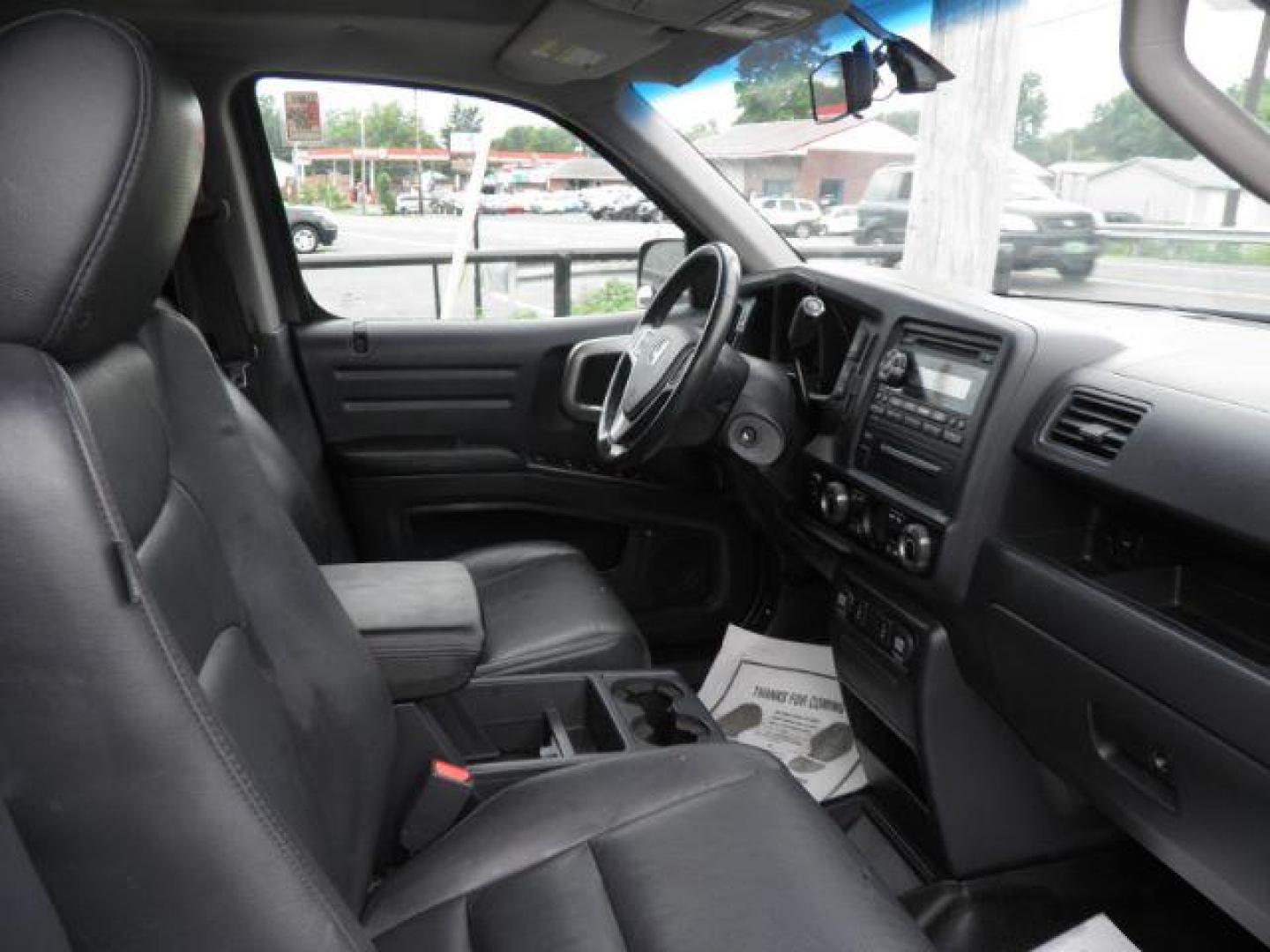 2011 Gray Honda Ridgeline RTL (5FPYK1F51BB) with an 3.5L V6 engine, AT transmission, located at 15520 McMullen Hwy SW, Belair, MD, 21502, (301) 729-3700, 39.581375, -78.846451 - Photo#1