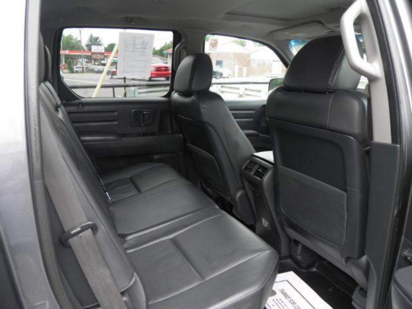 2011 Gray Honda Ridgeline RTL (5FPYK1F51BB) with an 3.5L V6 engine, AT transmission, located at 15520 McMullen Hwy SW, Belair, MD, 21502, (301) 729-3700, 39.581375, -78.846451 - Photo#2