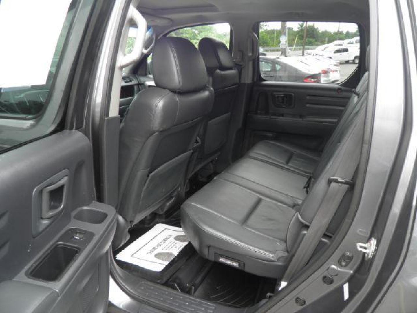 2011 Gray Honda Ridgeline RTL (5FPYK1F51BB) with an 3.5L V6 engine, AT transmission, located at 15520 McMullen Hwy SW, Belair, MD, 21502, (301) 729-3700, 39.581375, -78.846451 - Photo#3