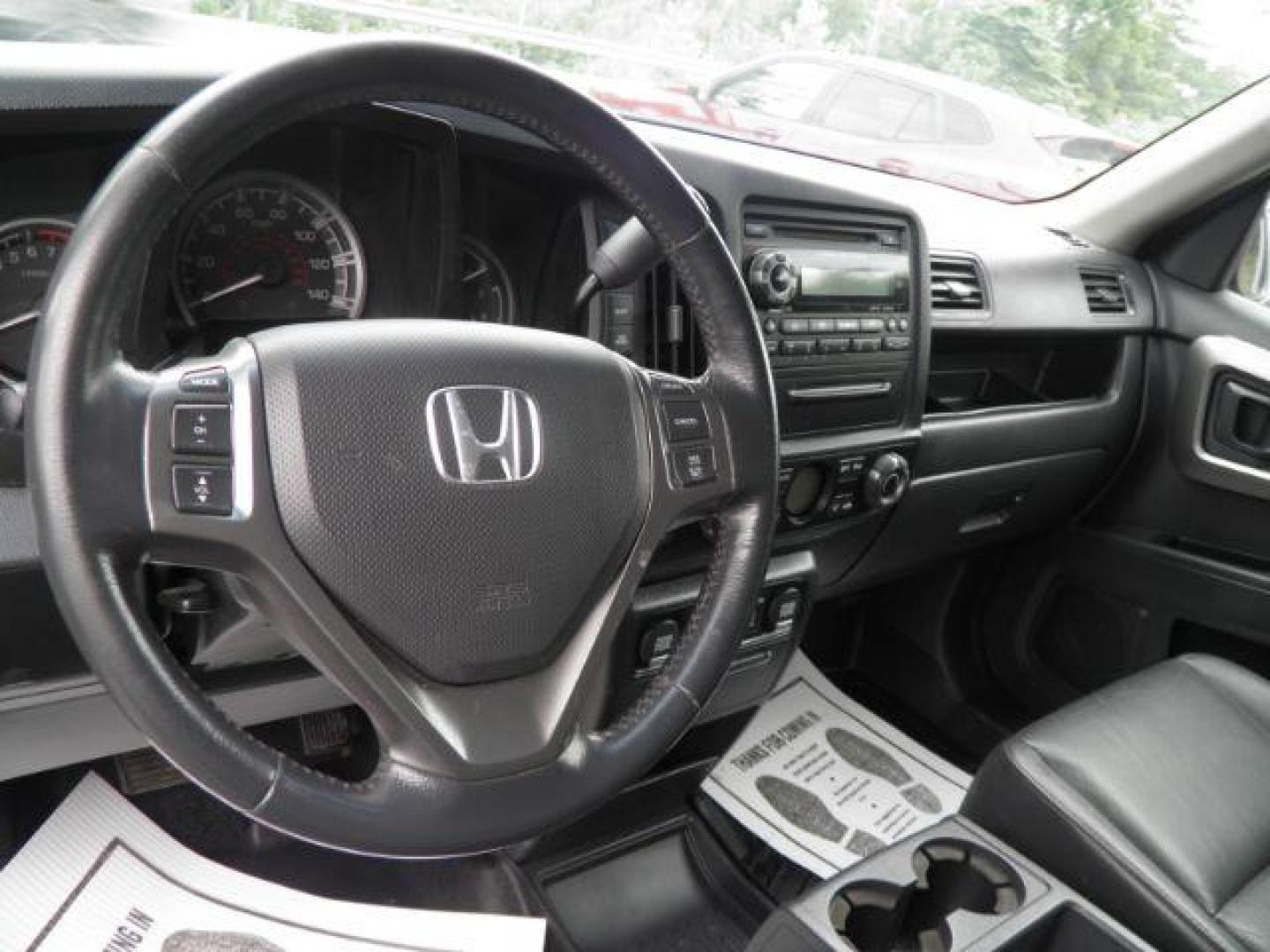 2011 Gray Honda Ridgeline RTL (5FPYK1F51BB) with an 3.5L V6 engine, AT transmission, located at 15520 McMullen Hwy SW, Belair, MD, 21502, (301) 729-3700, 39.581375, -78.846451 - Photo#5