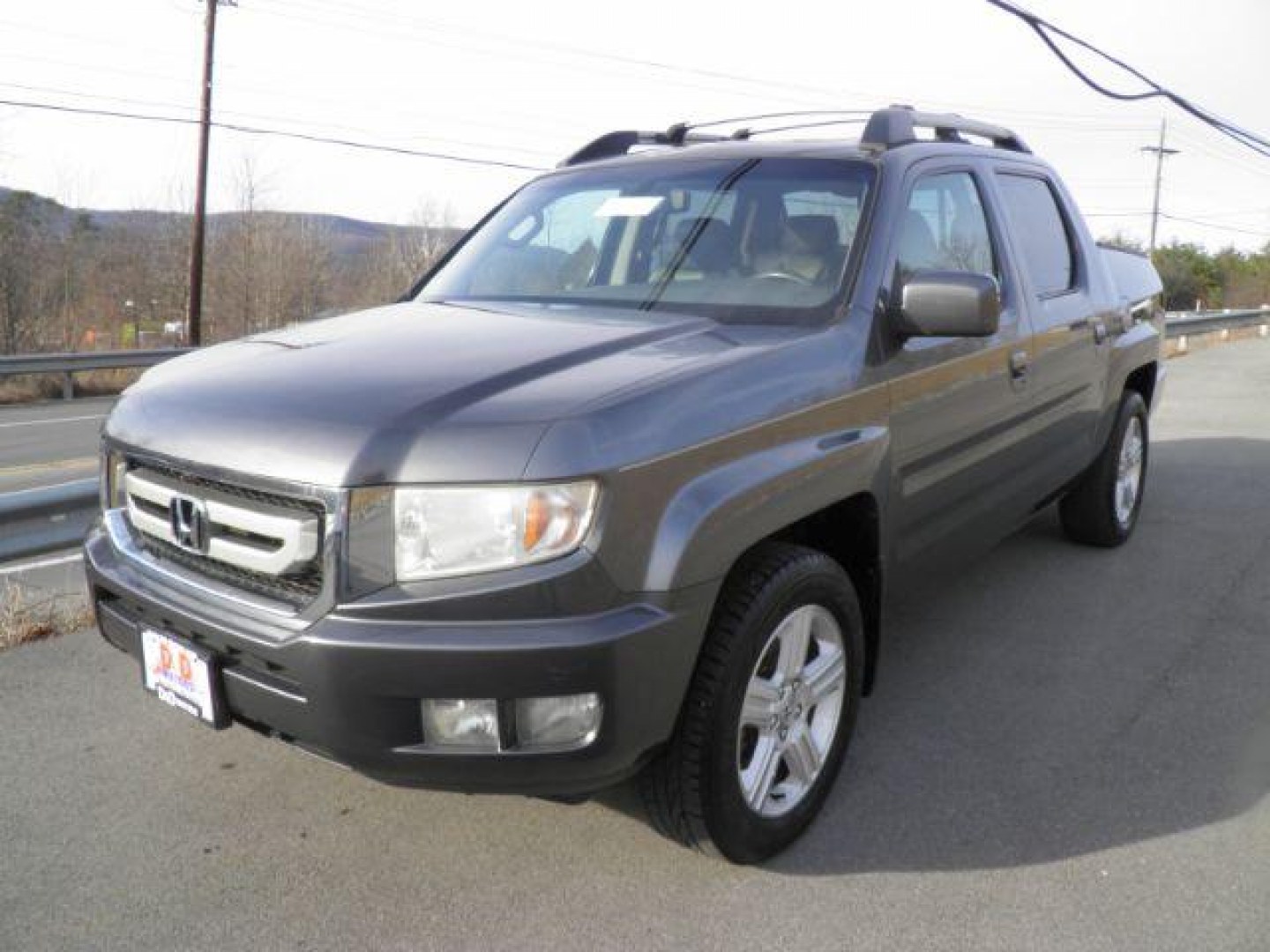 2011 Gray Honda Ridgeline RTL (5FPYK1F59BB) with an 3.5L V6 engine, AT transmission, located at 15520 McMullen Hwy SW, Belair, MD, 21502, (301) 729-3700, 39.581375, -78.846451- Photo#0