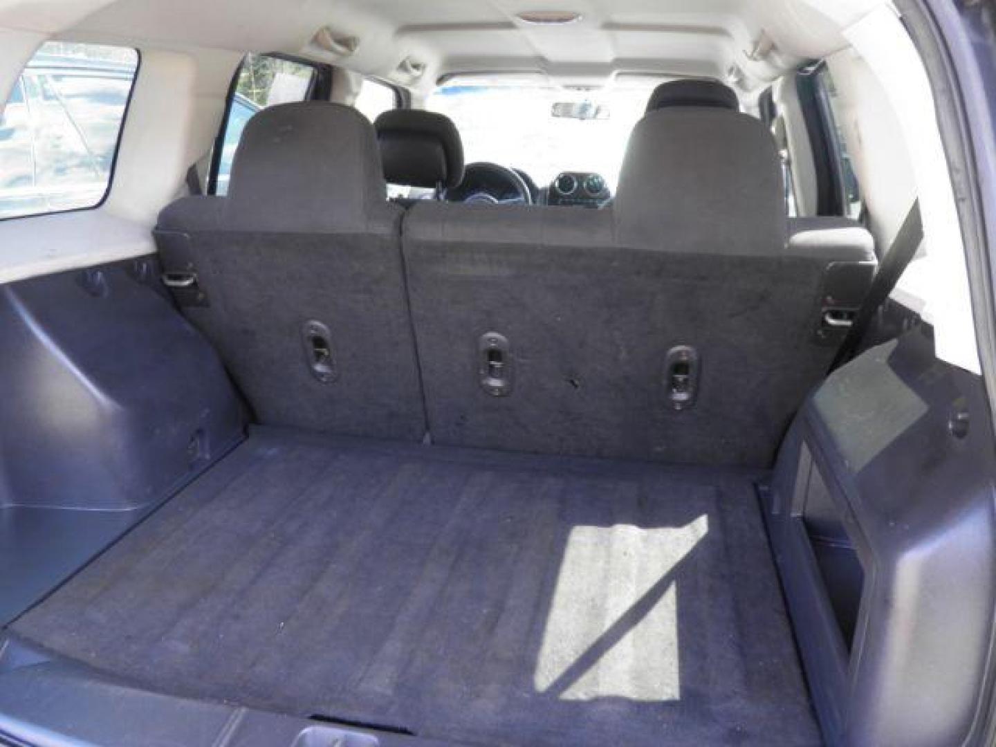 2011 BLACK Jeep Patriot 4WD (1J4NF1GB4BD) with an 2.4 L4 engine, located at 19521 New George's Creek Rd SW, Barton, MD, 21521, (301) 463-2404, 39.524323, -79.017906 - Photo#4