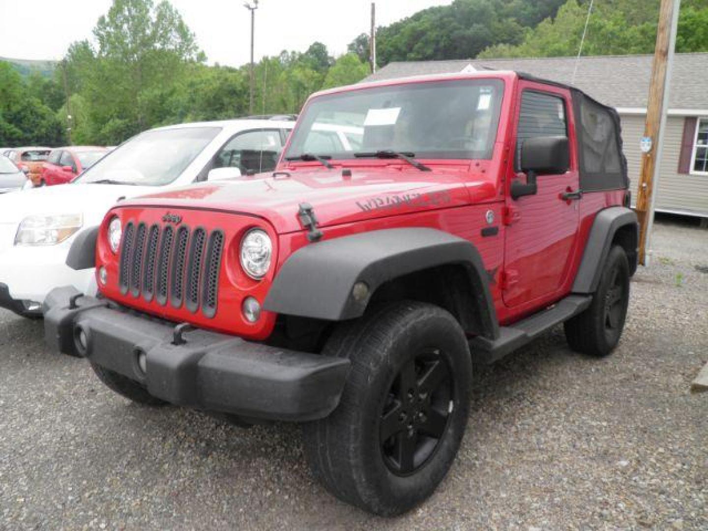 2011 Red Jeep Wrangler Sport (1J4AA2D16BL) with an 3.8L V6 engine, MAN transmission, located at 15520 McMullen Hwy SW, Belair, MD, 21502, (301) 729-3700, 39.581375, -78.846451 - Photo#0