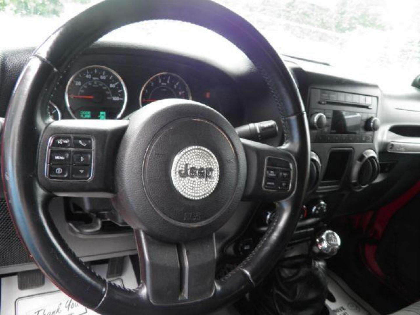 2011 Red Jeep Wrangler Sport (1J4AA2D16BL) with an 3.8L V6 engine, MAN transmission, located at 15520 McMullen Hwy SW, Belair, MD, 21502, (301) 729-3700, 39.581375, -78.846451 - Photo#2