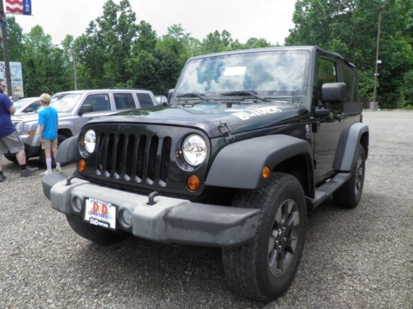 2011 GREEN Jeep Wrangler Sport 4WD (1J4AA2D17BL) with an 3.8 V6 engine, AT transmission, located at 19521 New George's Creek Rd SW, Barton, MD, 21521, (301) 463-2404, 39.524323, -79.017906- Photo#0