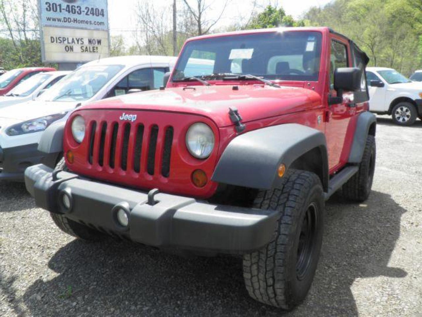 2011 RED Jeep Wrangler Sport 4WD (1J4AA2D14BL) with an 3.8 V6 engine, AT transmission, located at 15520 McMullen Hwy SW, Belair, MD, 21502, (301) 729-3700, 39.581375, -78.846451 - Photo#0