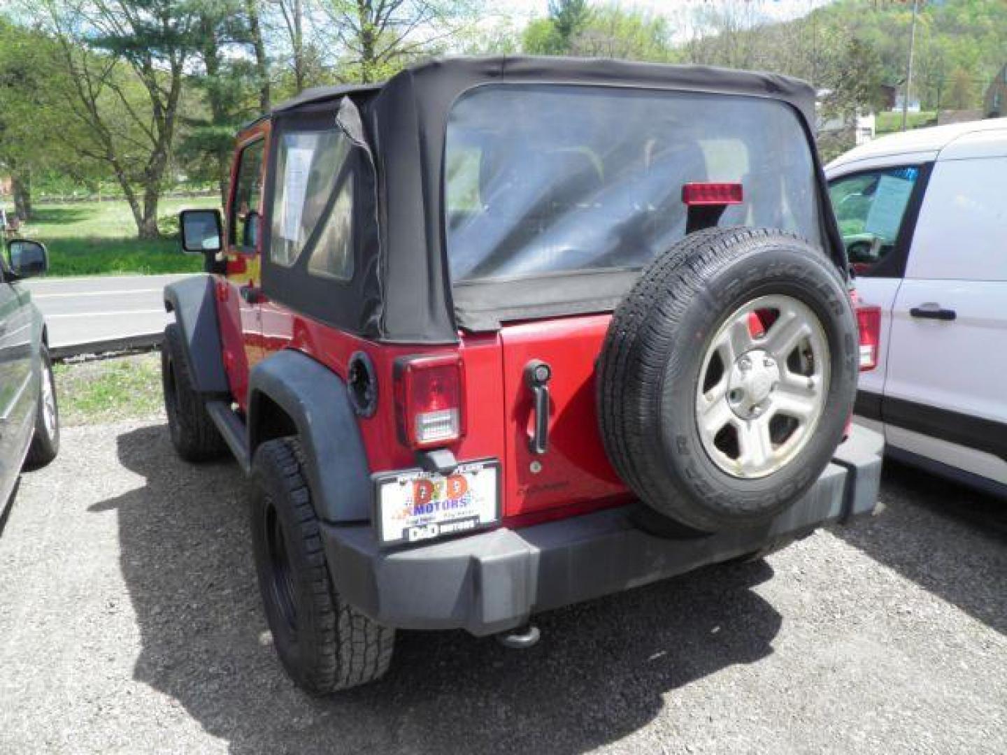2011 RED Jeep Wrangler Sport 4WD (1J4AA2D14BL) with an 3.8 V6 engine, AT transmission, located at 15520 McMullen Hwy SW, Belair, MD, 21502, (301) 729-3700, 39.581375, -78.846451 - Photo#4