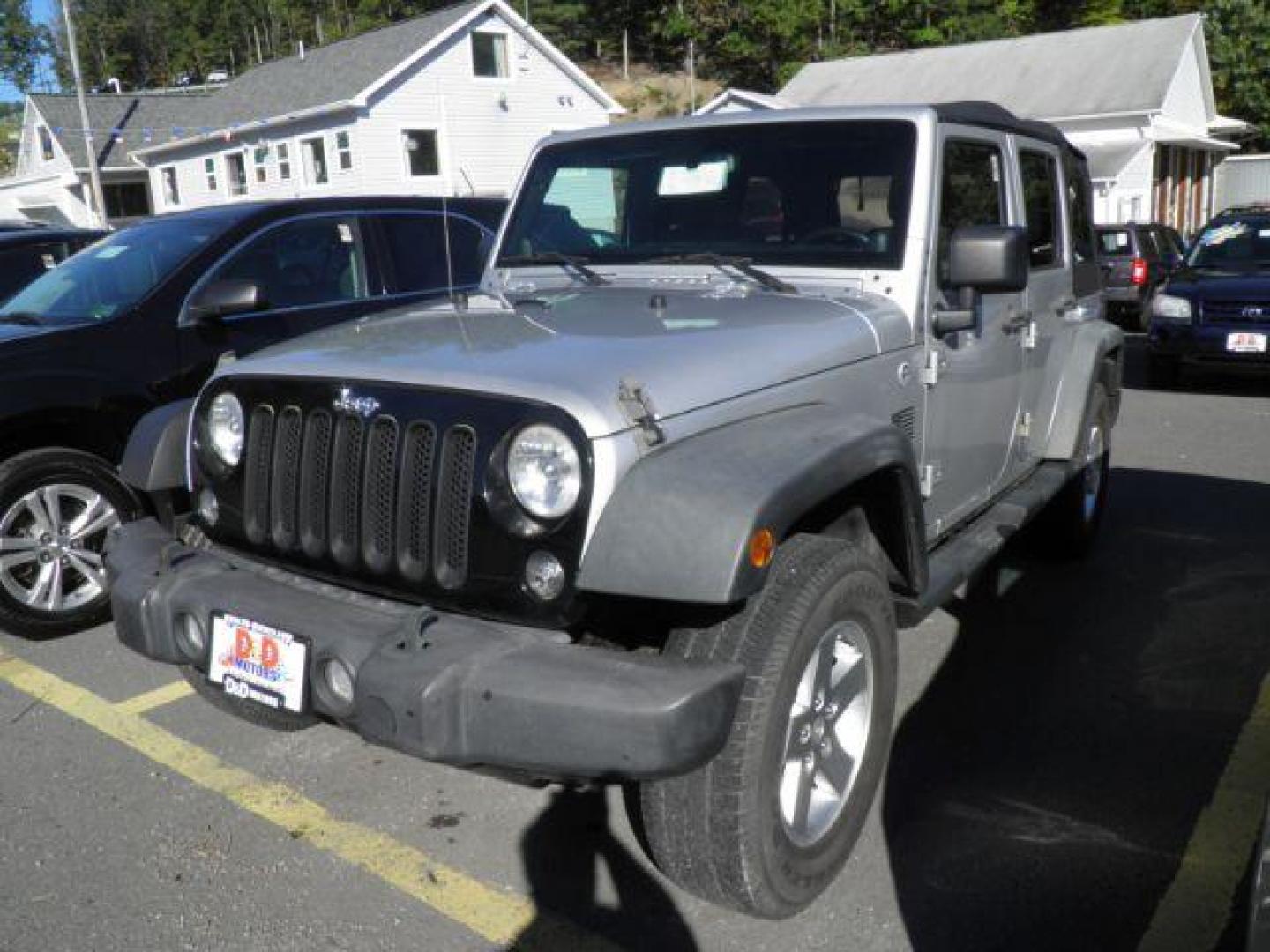 2011 Silver Jeep Wrangler Unlimited Sport (1J4BA3H13BL) with an 3.8L V6 engine, AT transmission, located at 15520 McMullen Hwy SW, Belair, MD, 21502, (301) 729-3700, 39.581375, -78.846451 - Photo#0