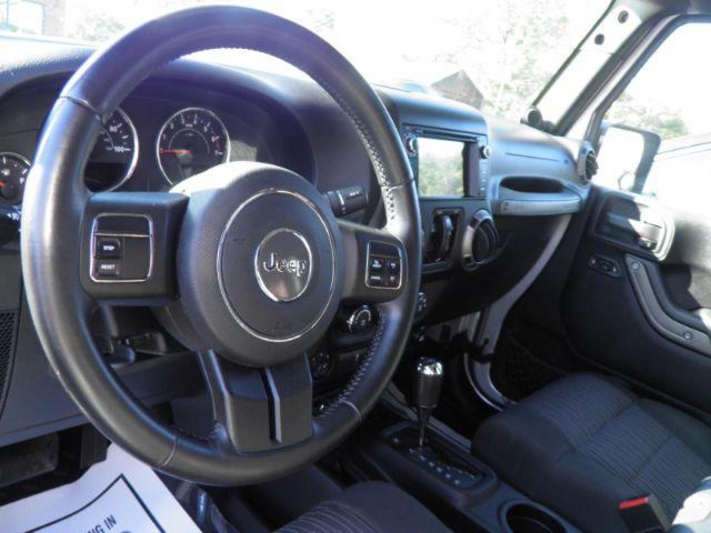 2011 Silver Jeep Wrangler Unlimited Sport (1J4BA3H13BL) with an 3.8L V6 engine, AT transmission, located at 15520 McMullen Hwy SW, Belair, MD, 21502, (301) 729-3700, 39.581375, -78.846451 - Photo#2