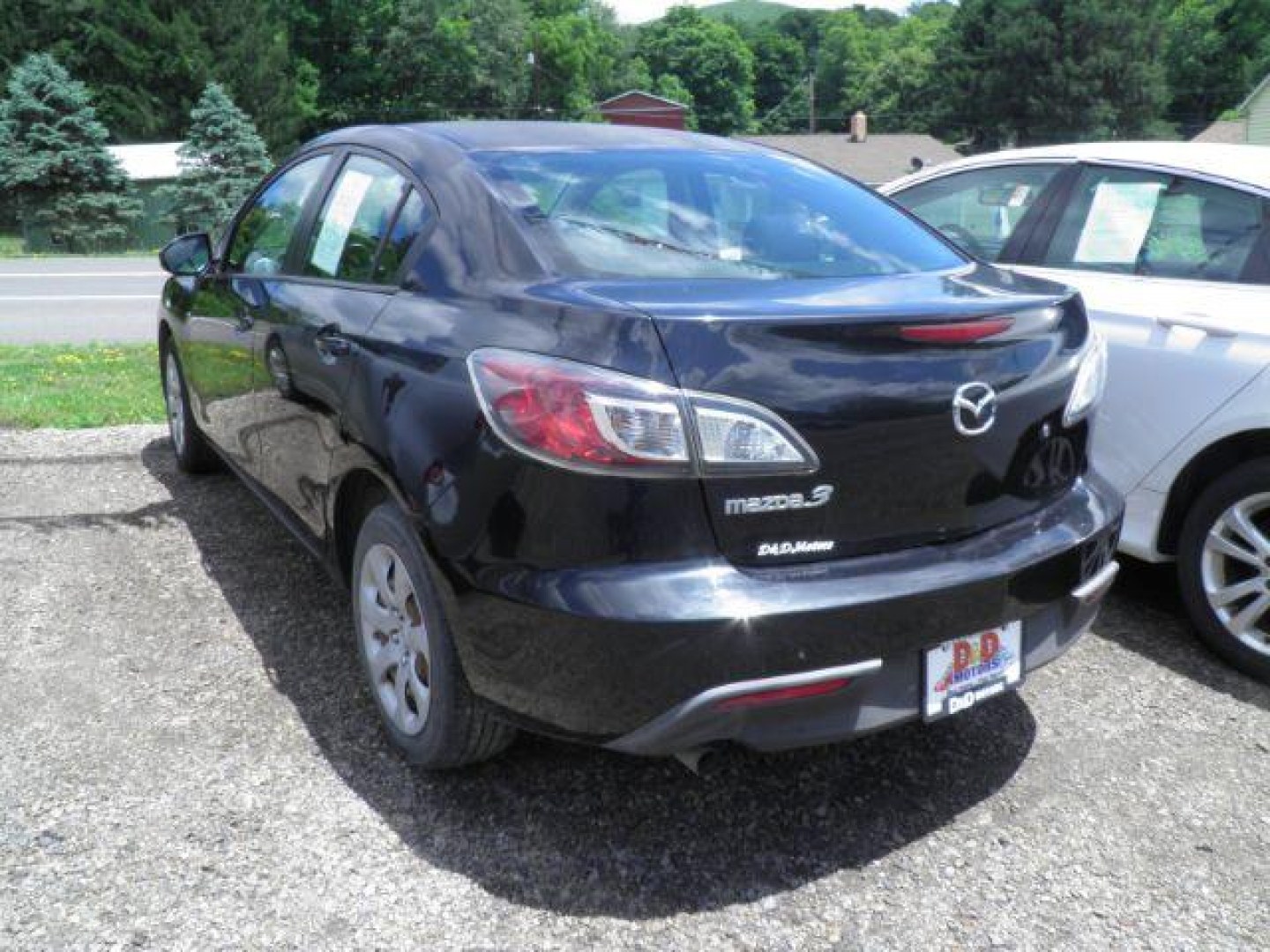 2011 BLACK Mazda MAZDA3 i Sport 4-Door (JM1BL1UF6B1) with an 2.0L L4 engine, 5SP transmission, located at 19521 New George's Creek Rd SW, Barton, MD, 21521, (301) 463-2404, 39.524323, -79.017906- Photo#4