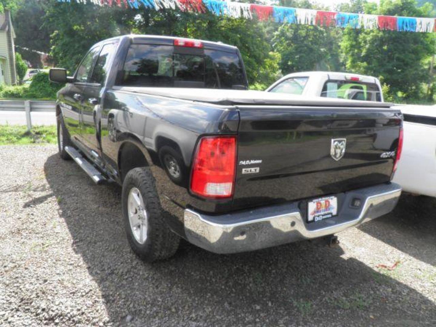 2011 Black RAM 1500 SLT Quad Cab 4WD (1D7RV1GTXBS) with an 5.7L V8 engine, AT transmission, located at 15520 McMullen Hwy SW, Belair, MD, 21502, (301) 729-3700, 39.581375, -78.846451 - Photo#4