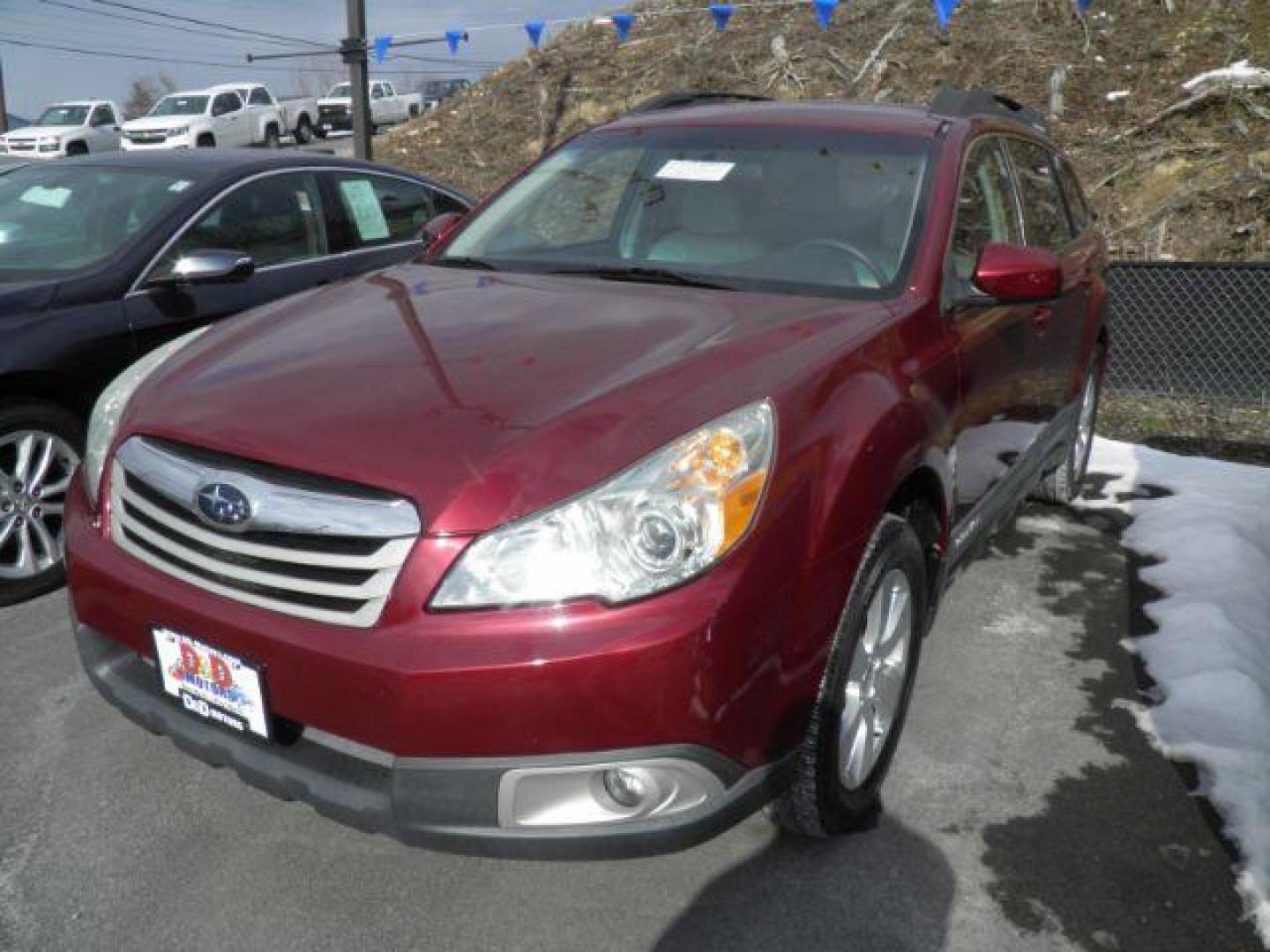 2011 RED Subaru Outback 2.5I Premium (4S4BRBCC4B1) with an 2.5 L4 engine, MAN transmission, located at 15520 McMullen Hwy SW, Belair, MD, 21502, (301) 729-3700, 39.581375, -78.846451 - Photo#0