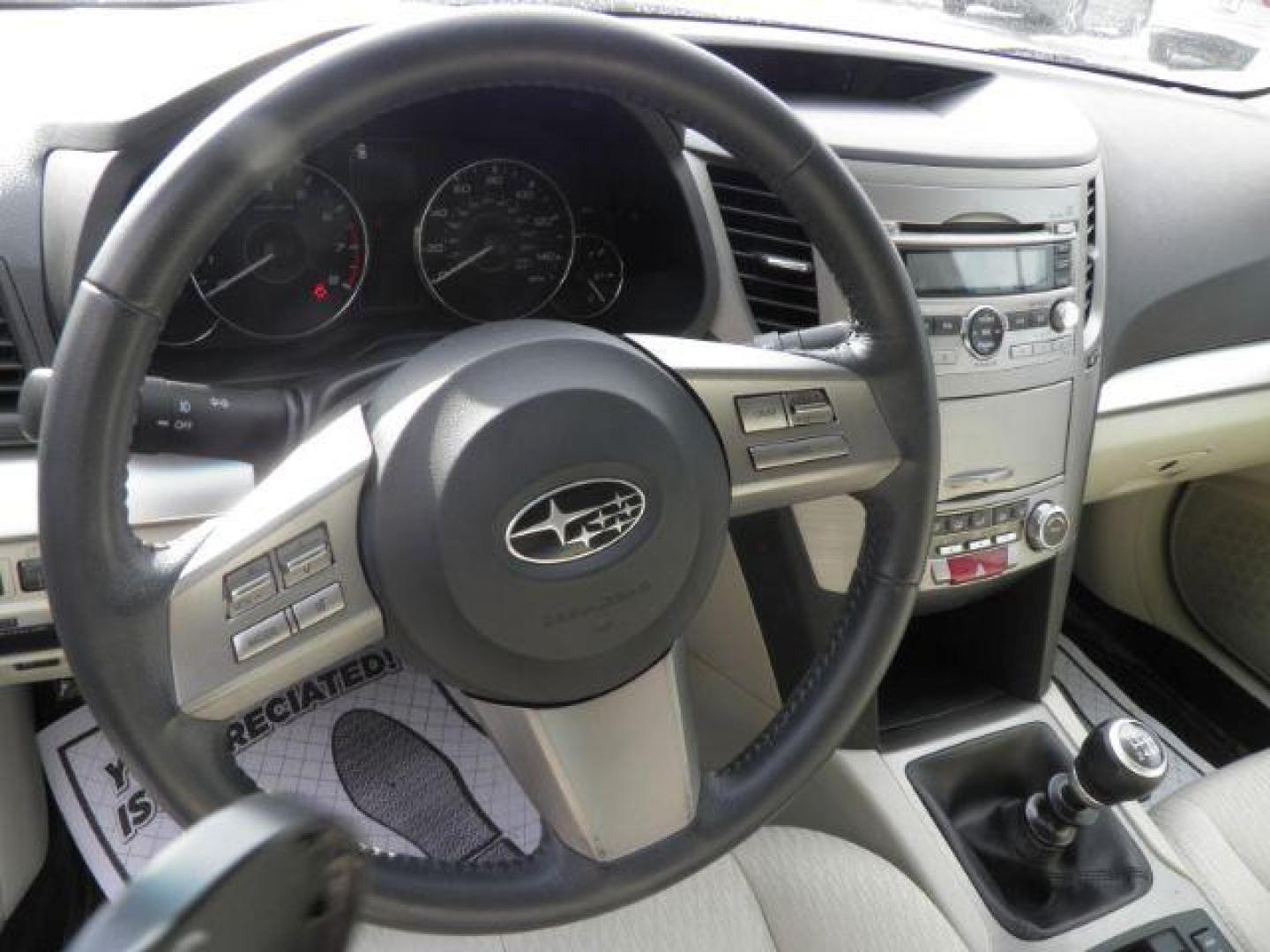 2011 RED Subaru Outback 2.5I Premium (4S4BRBCC4B1) with an 2.5 L4 engine, MAN transmission, located at 15520 McMullen Hwy SW, Belair, MD, 21502, (301) 729-3700, 39.581375, -78.846451 - Photo#2