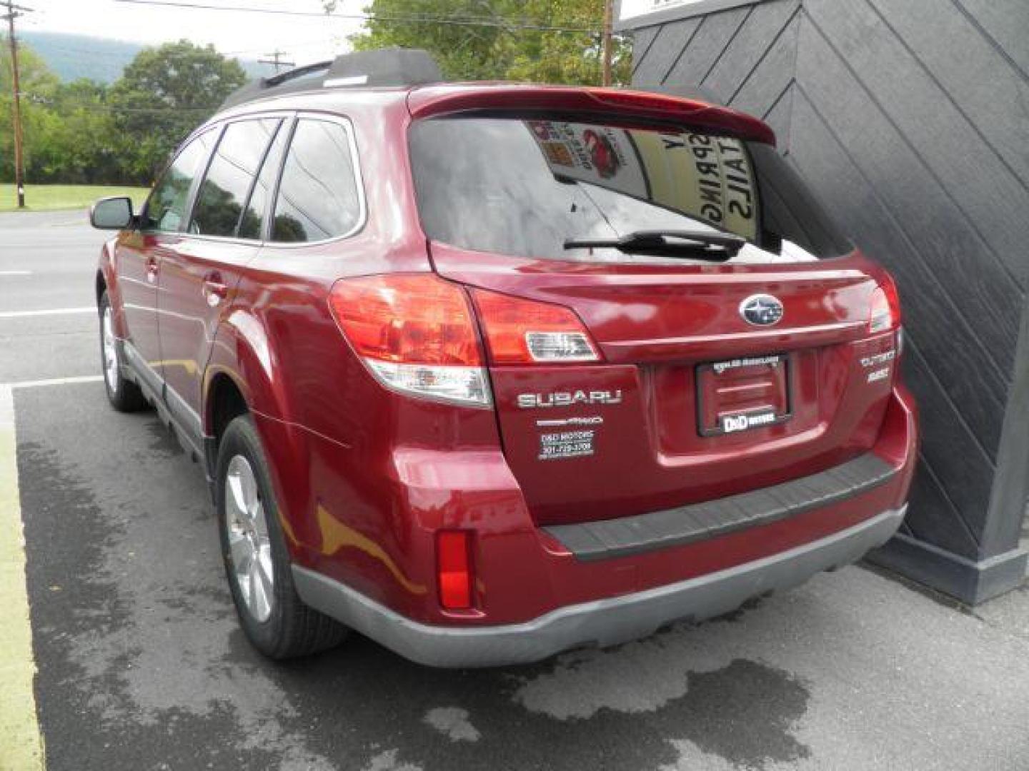 2011 Red Subaru Outback 2.5I Premium (4S4BRBCC4B1) with an 2.5L H4 engine, MAN transmission, located at 15520 McMullen Hwy SW, Belair, MD, 21502, (301) 729-3700, 39.581375, -78.846451 - Photo#5
