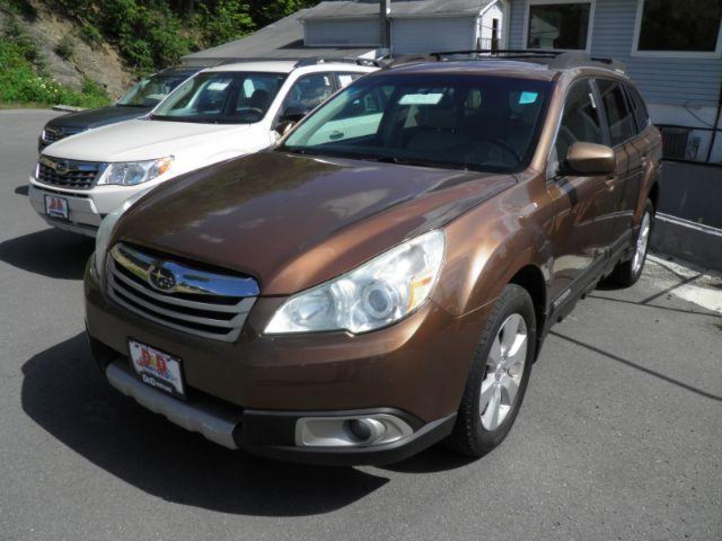 2011 BROWN Subaru Outback 2.5i Limited (4S4BRBKC9B3) with an 2.5 L4 engine, CVT transmission, located at 15520 McMullen Hwy SW, Belair, MD, 21502, (301) 729-3700, 39.581375, -78.846451- Photo#0