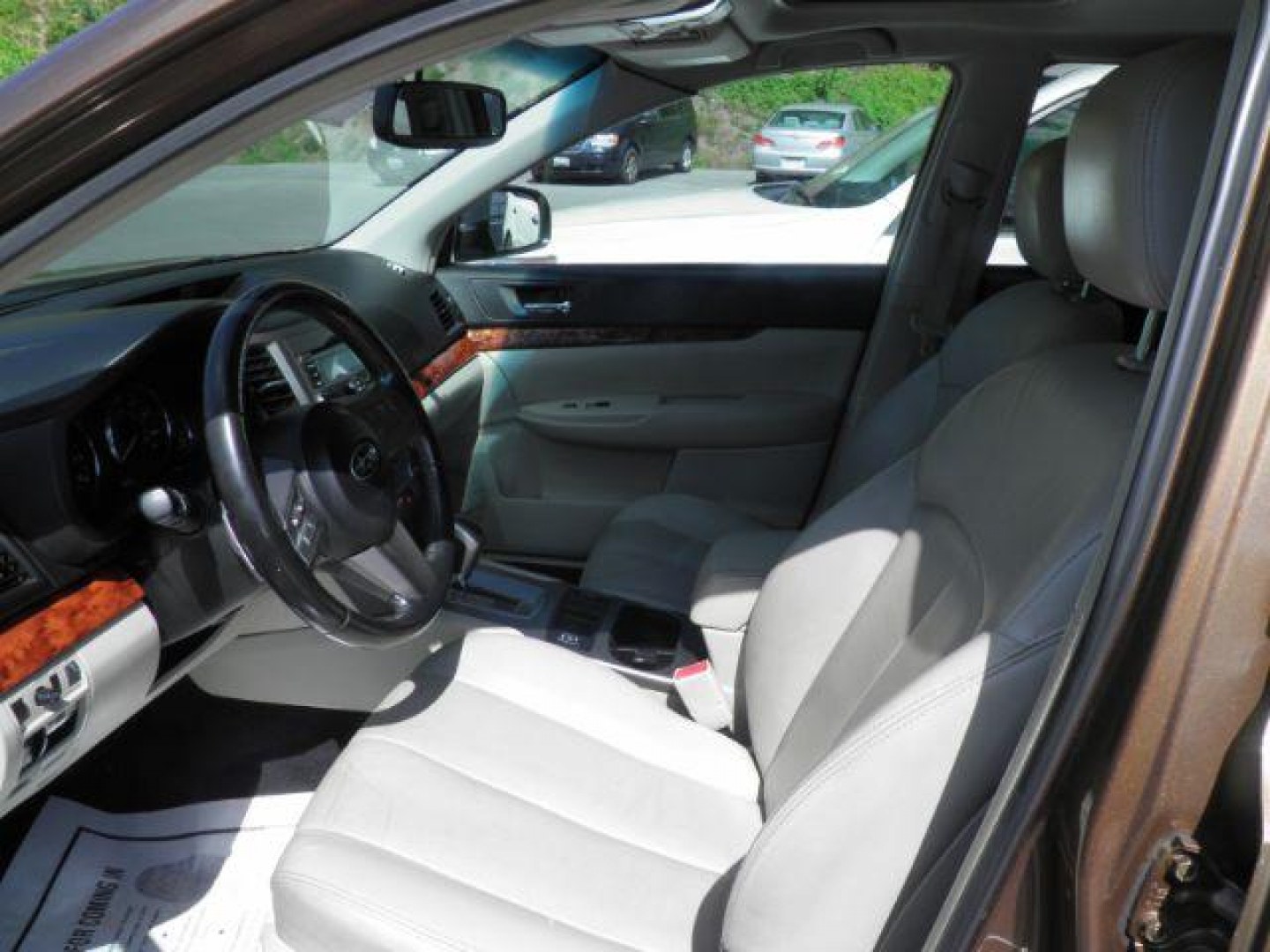 2011 BROWN Subaru Outback 2.5i Limited (4S4BRBKC9B3) with an 2.5 L4 engine, CVT transmission, located at 15520 McMullen Hwy SW, Belair, MD, 21502, (301) 729-3700, 39.581375, -78.846451- Photo#1