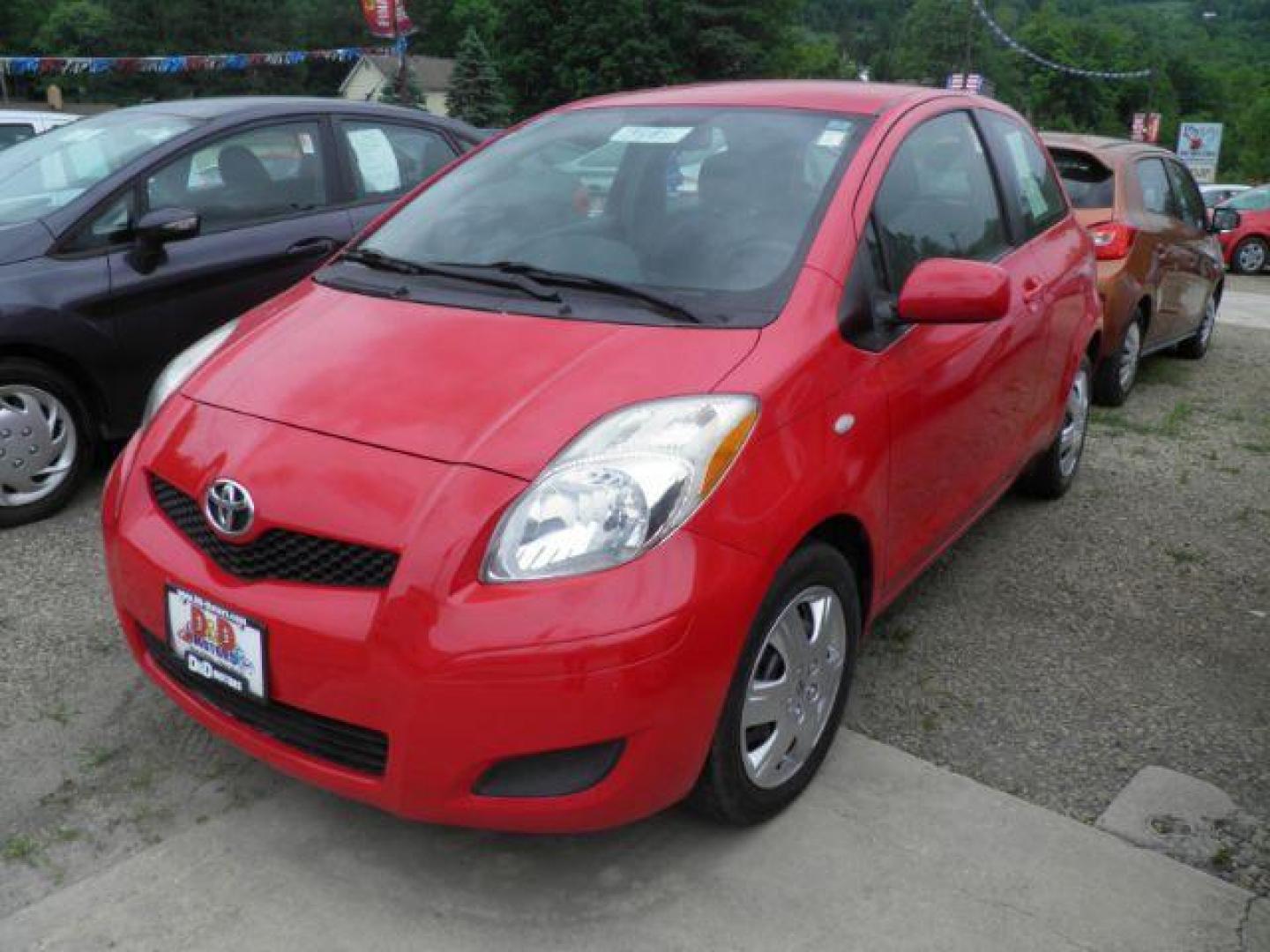 2011 Red Toyota Yaris BASE (JTDJT4K30B5) with an 2.4L I4 engine, AT transmission, located at 19521 New George's Creek Rd SW, Barton, MD, 21521, (301) 463-2404, 39.524323, -79.017906 - Photo#0