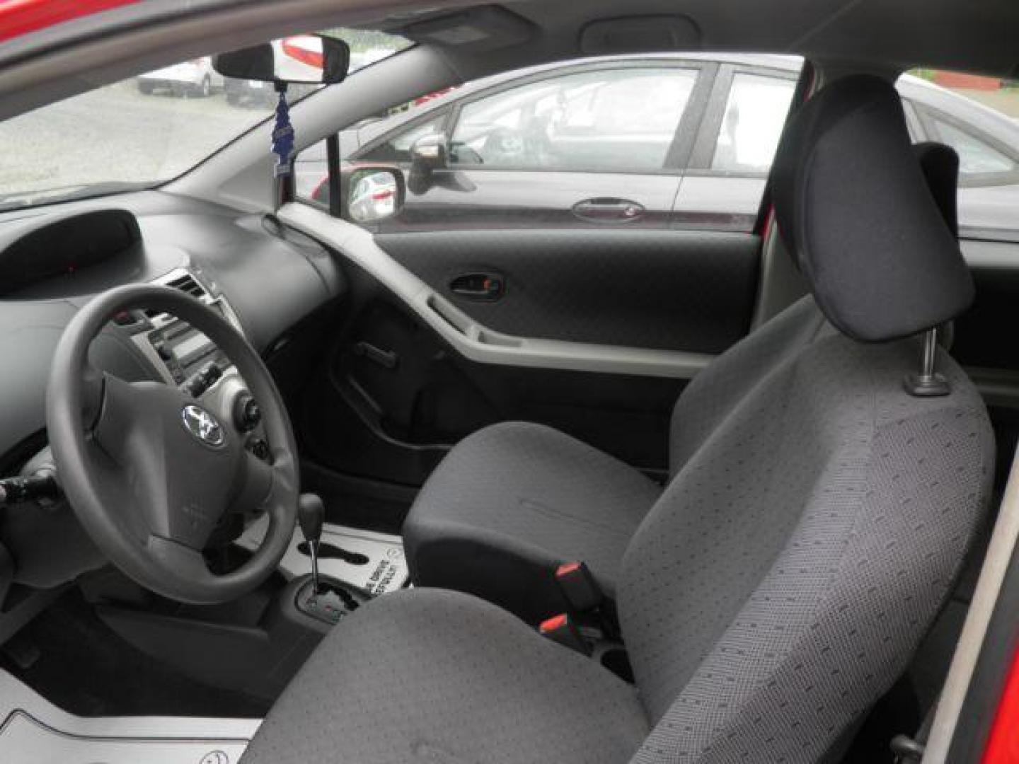 2011 Red Toyota Yaris BASE (JTDJT4K30B5) with an 2.4L I4 engine, AT transmission, located at 19521 New George's Creek Rd SW, Barton, MD, 21521, (301) 463-2404, 39.524323, -79.017906 - Photo#1