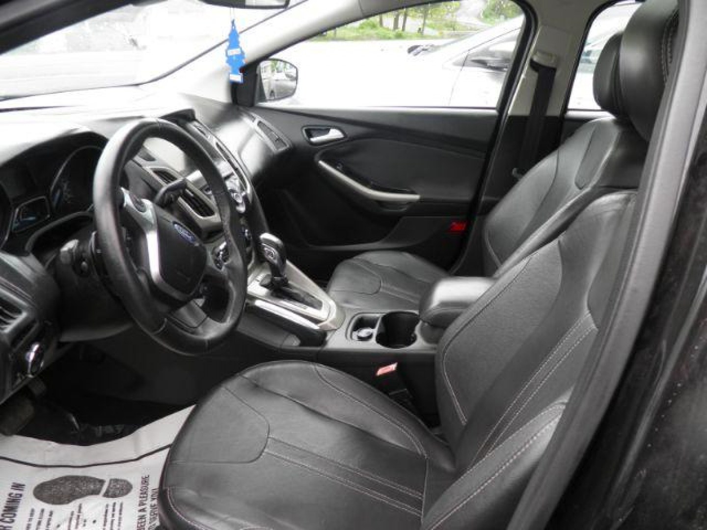 2012 Black Ford Focus SEL Sedan (1FAHP3H2XCL) with an 2.0L I4 engine, AT transmission, located at 19521 New George's Creek Rd SW, Barton, MD, 21521, (301) 463-2404, 39.524323, -79.017906- Photo#1