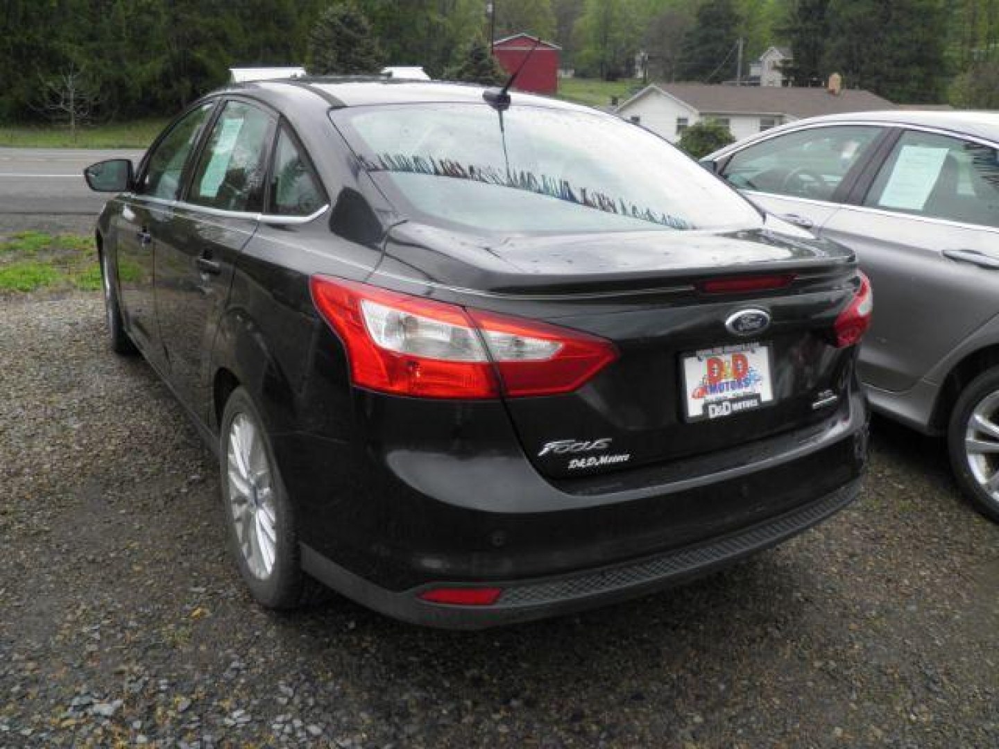 2012 Black Ford Focus SEL Sedan (1FAHP3H2XCL) with an 2.0L I4 engine, AT transmission, located at 19521 New George's Creek Rd SW, Barton, MD, 21521, (301) 463-2404, 39.524323, -79.017906- Photo#3