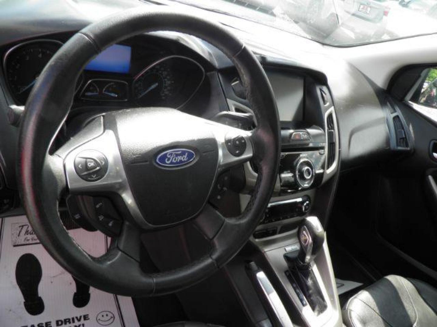 2012 Black Ford Focus SEL Sedan (1FAHP3H2XCL) with an 2.0L I4 engine, AT transmission, located at 19521 New George's Creek Rd SW, Barton, MD, 21521, (301) 463-2404, 39.524323, -79.017906 - Photo#2