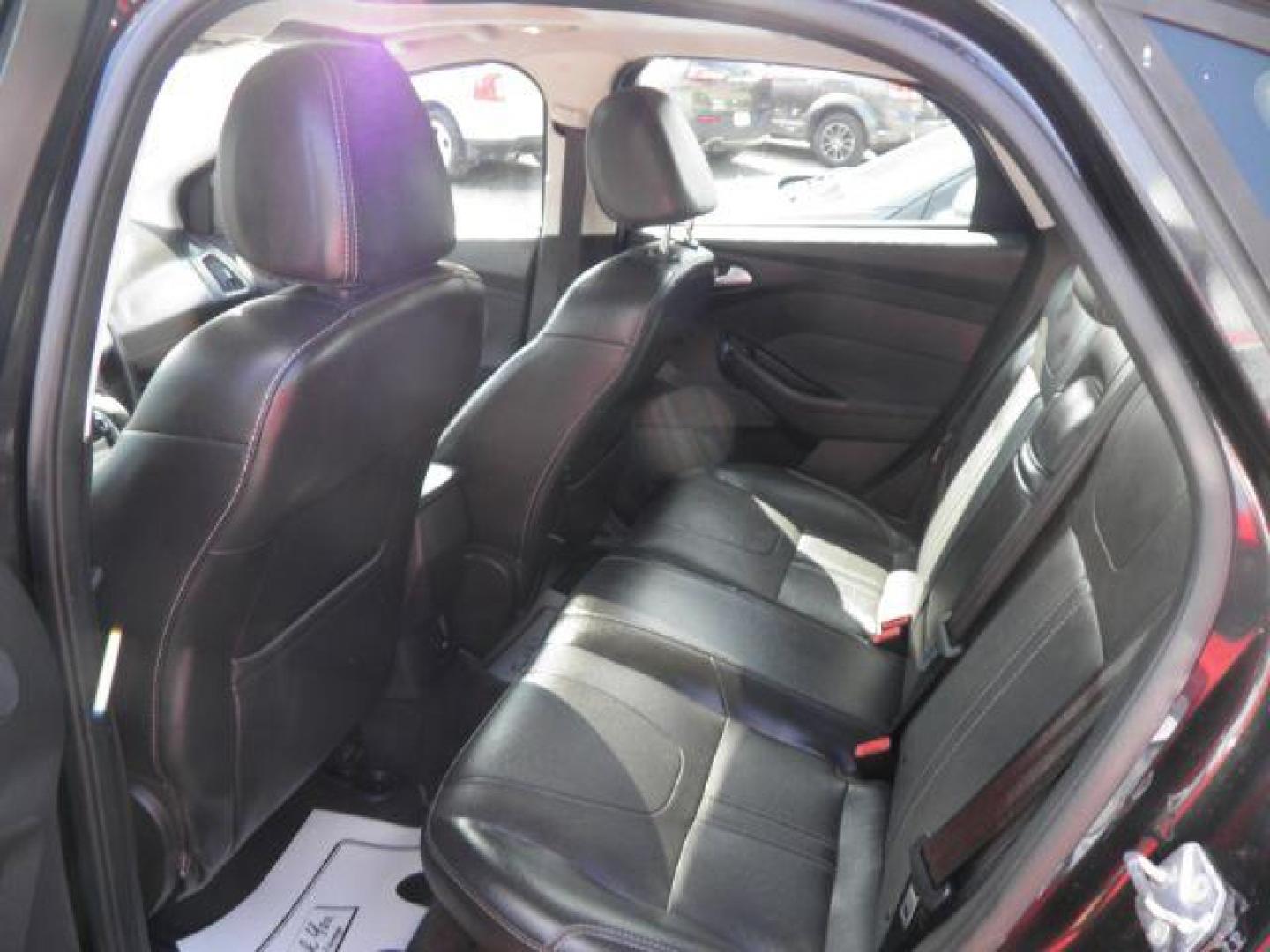 2012 Black Ford Focus SEL Sedan (1FAHP3H2XCL) with an 2.0L I4 engine, AT transmission, located at 19521 New George's Creek Rd SW, Barton, MD, 21521, (301) 463-2404, 39.524323, -79.017906 - Photo#3