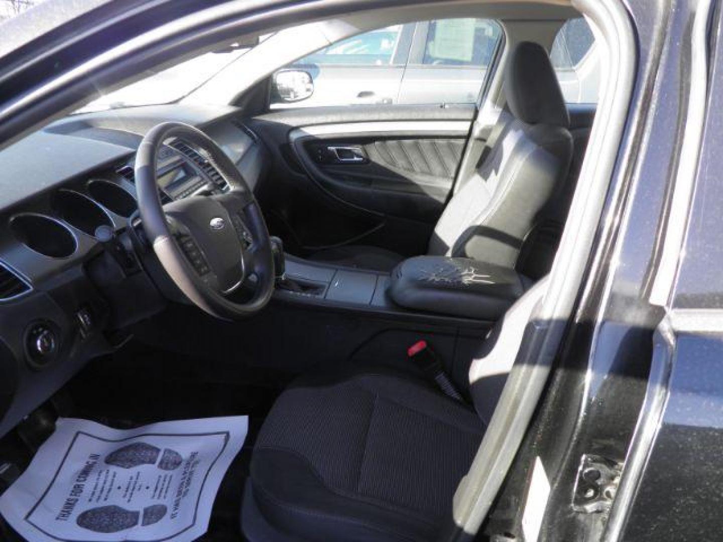 2012 Black Ford Taurus SEL FWD (1FAHP2EW8CG) with an 3.5L V6 engine, AT transmission, located at 15520 McMullen Hwy SW, Belair, MD, 21502, (301) 729-3700, 39.581375, -78.846451 - Photo#1