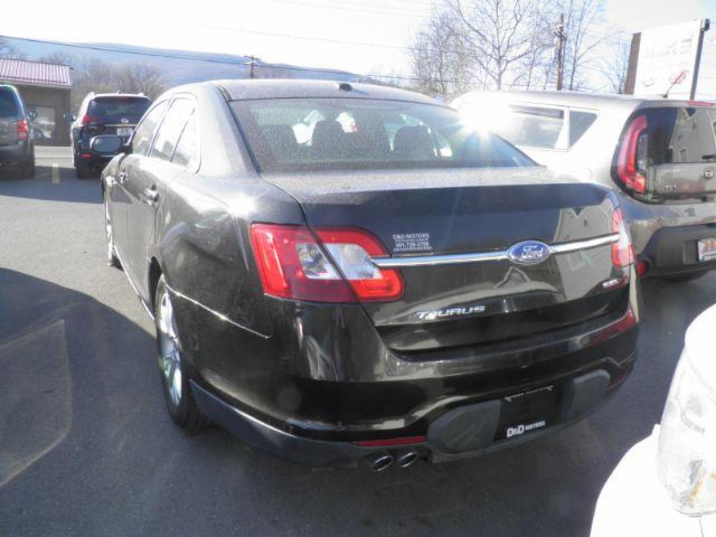 2012 Black Ford Taurus SEL FWD (1FAHP2EW8CG) with an 3.5L V6 engine, AT transmission, located at 15520 McMullen Hwy SW, Belair, MD, 21502, (301) 729-3700, 39.581375, -78.846451 - Photo#4